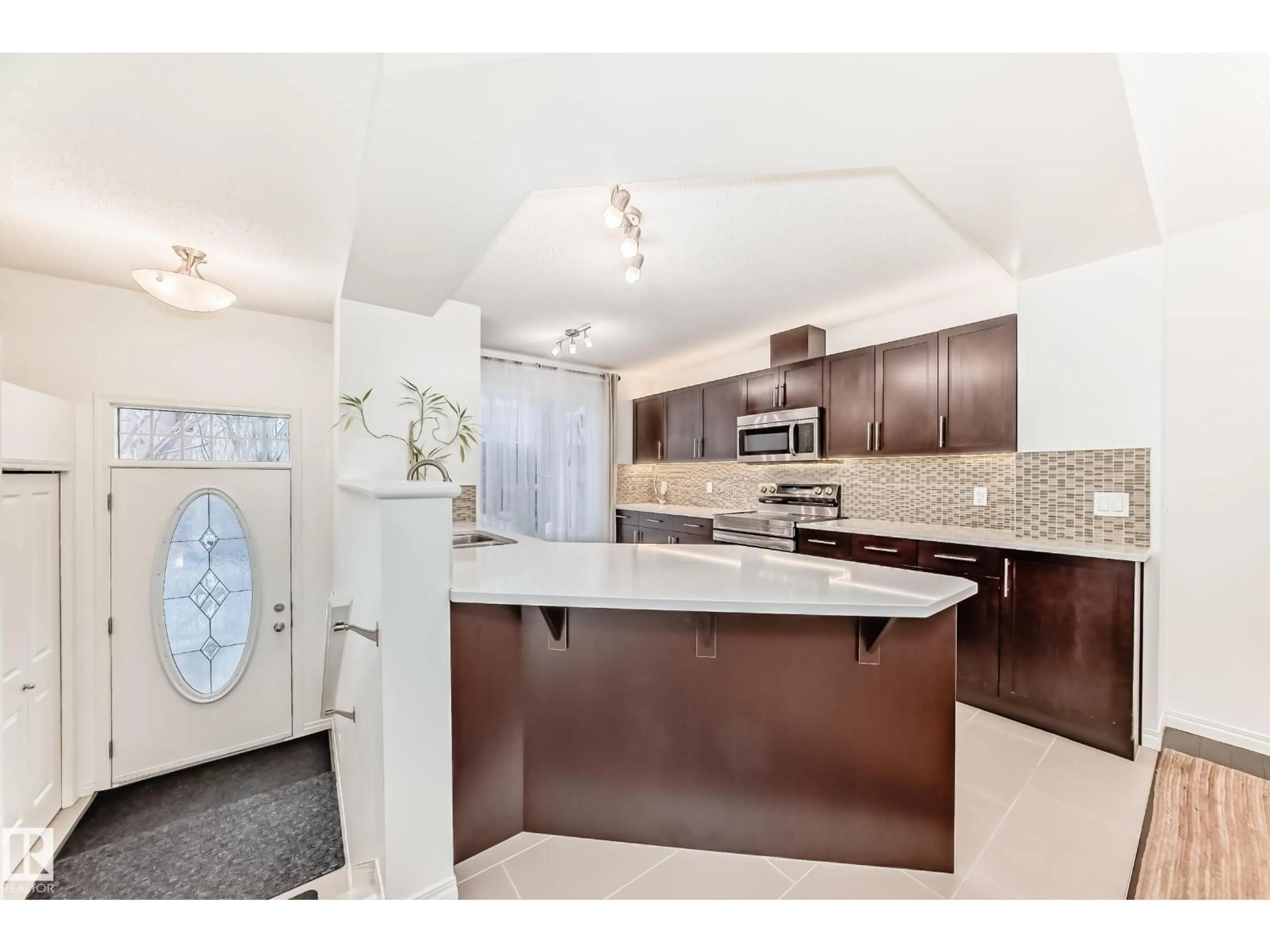 Open concept kitchen, ceramic/tile floor for 460 - 50 HEMINGWAY RD, Edmonton Alberta T6M0M5