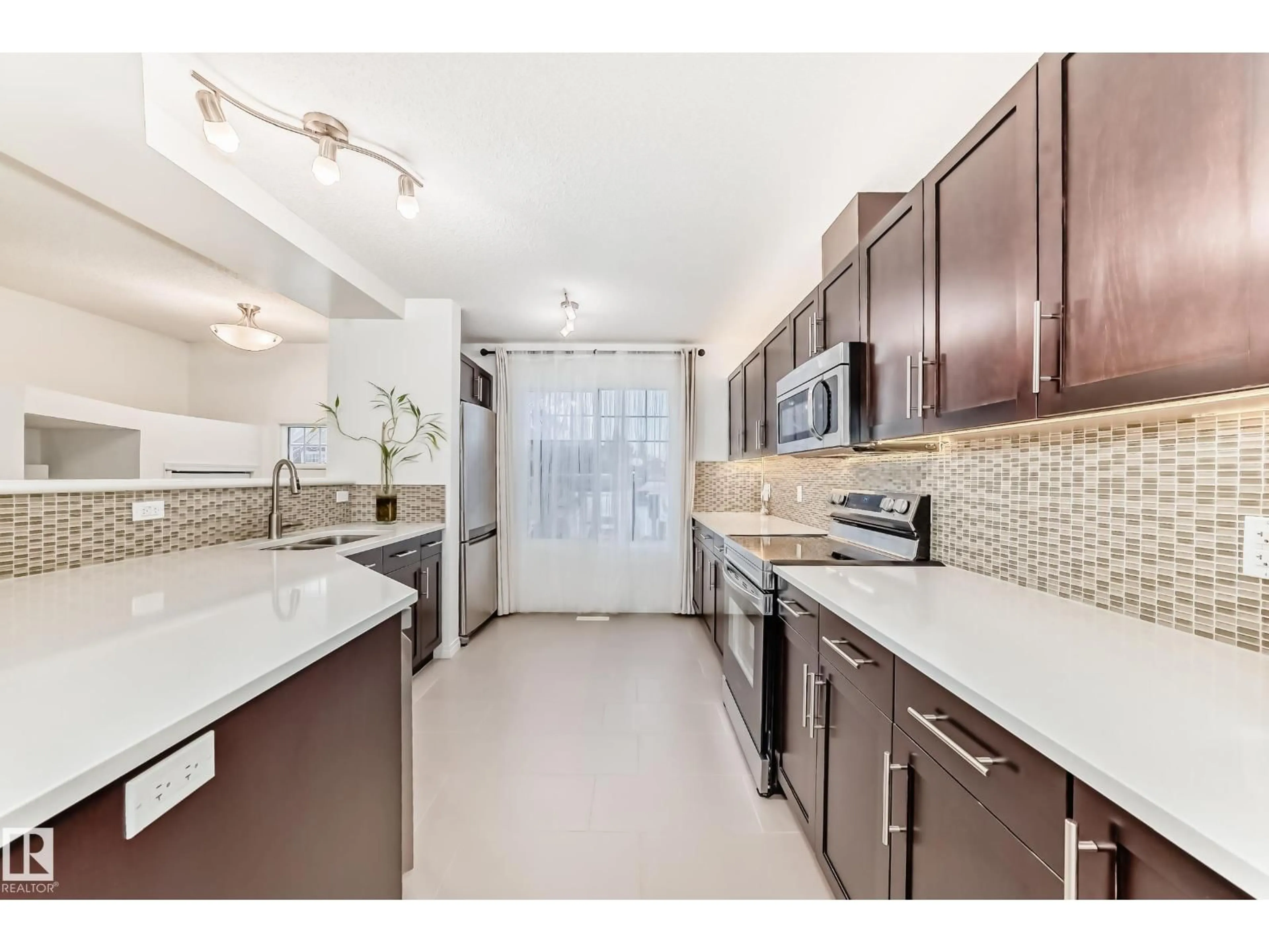 Open concept kitchen, ceramic/tile floor for 460 - 50 HEMINGWAY RD, Edmonton Alberta T6M0M5