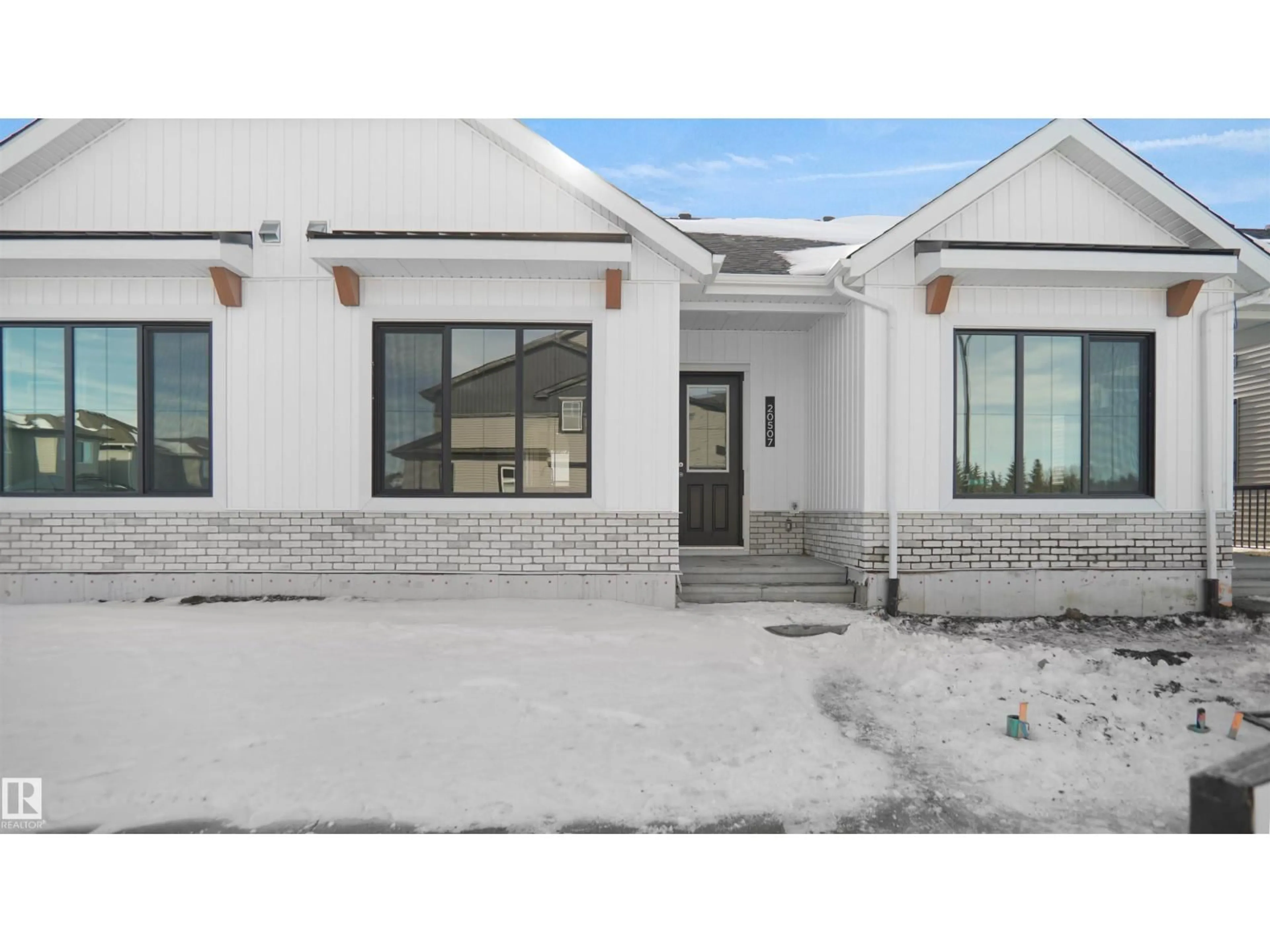 Home with brick exterior material, street for 20705 42 AV, Edmonton Alberta T6M0R8