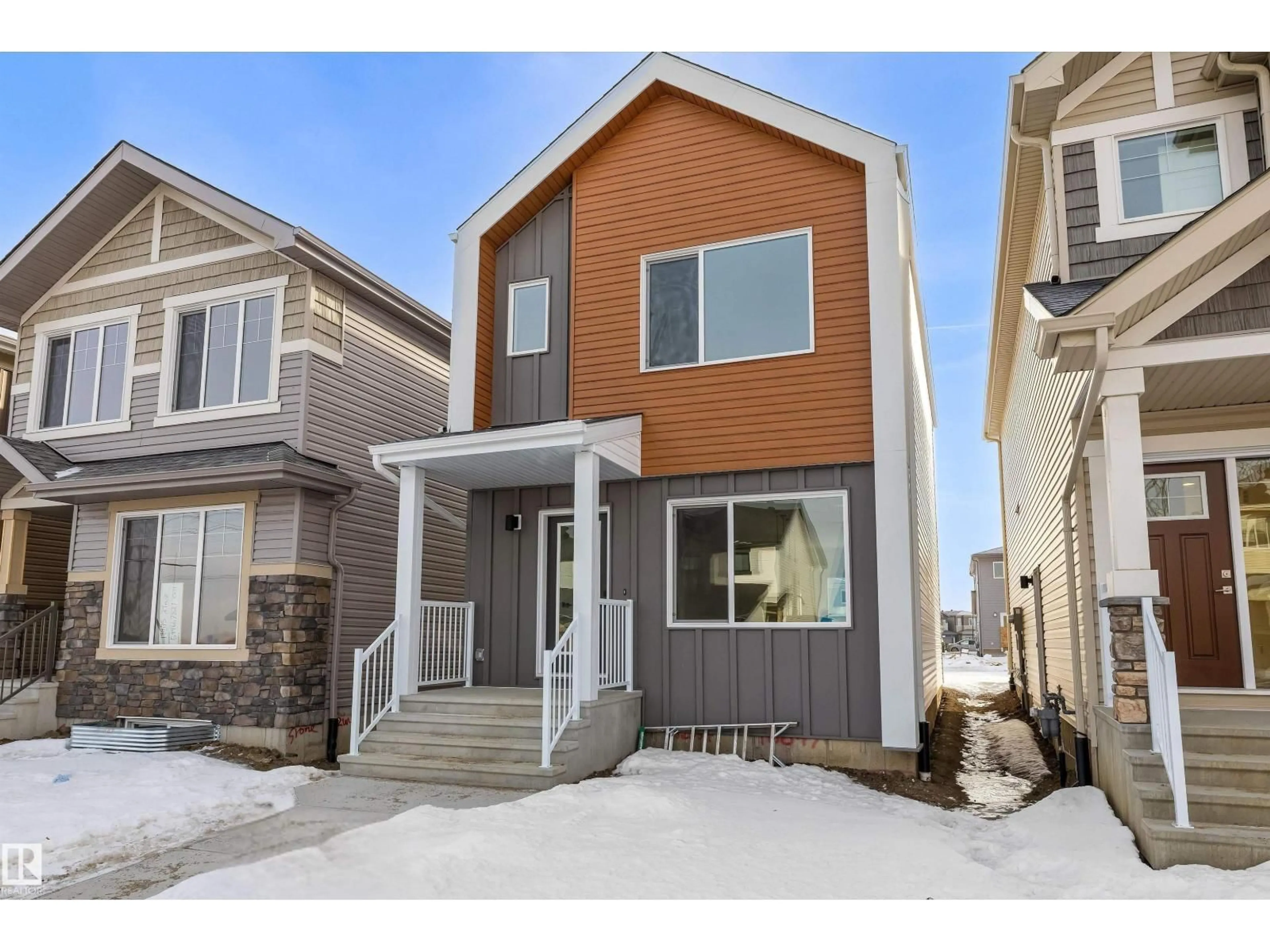 Home with vinyl exterior material, street for 18847 29 AV, Edmonton Alberta T6M3C5