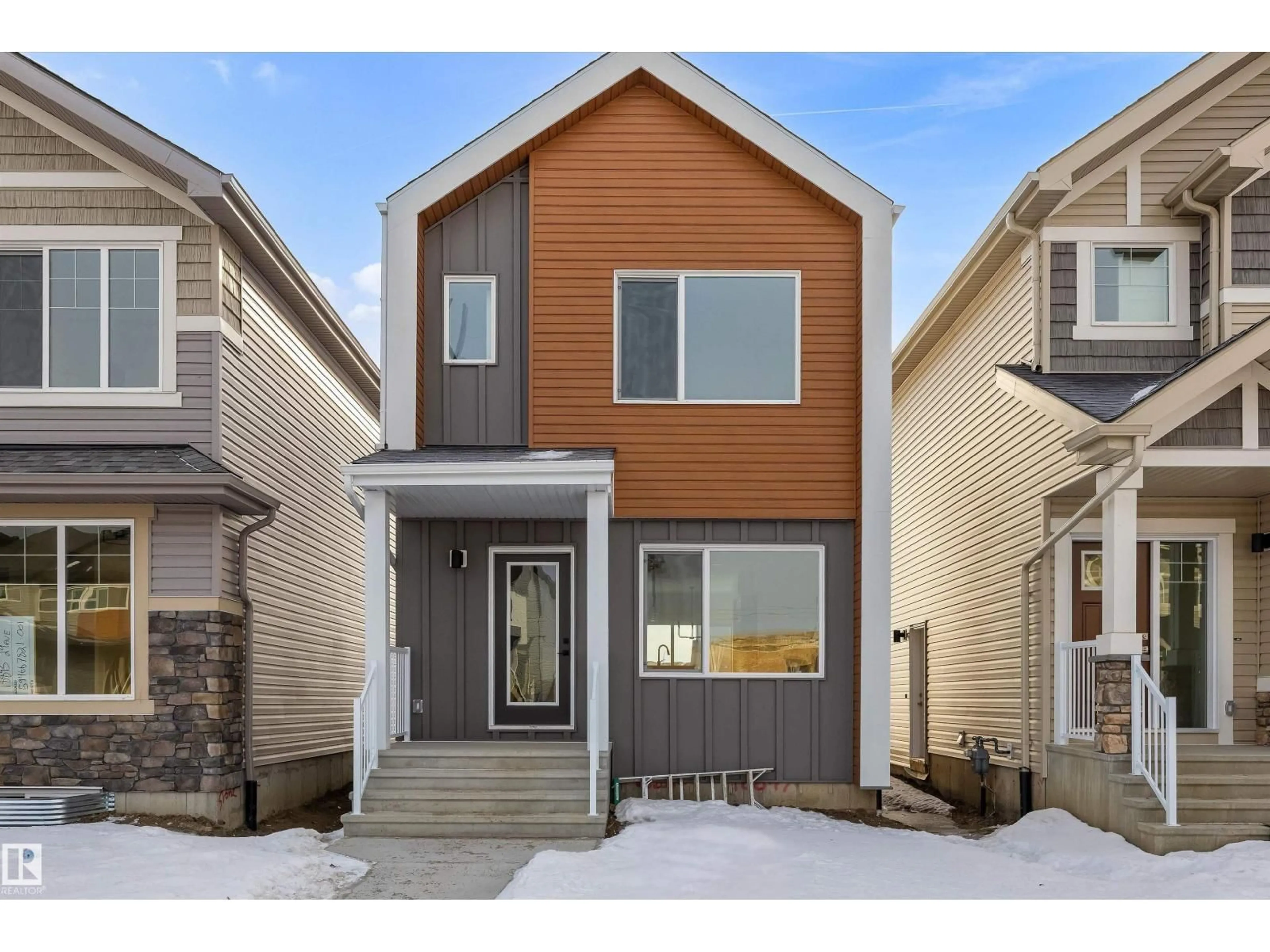 Home with vinyl exterior material, street for 18847 29 AV, Edmonton Alberta T6M3C5