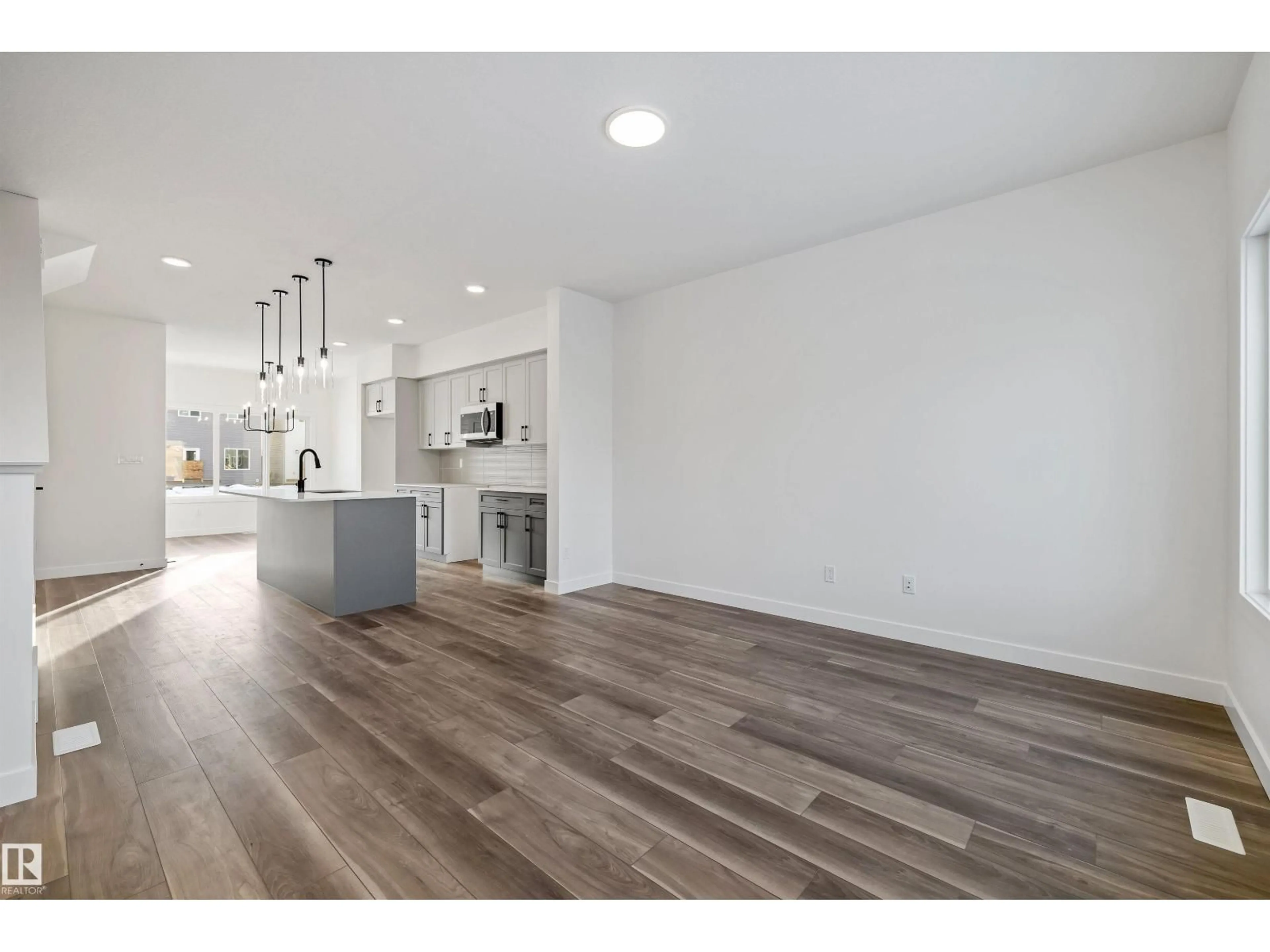 Open concept kitchen, unknown for 18847 29 AV, Edmonton Alberta T6M3C5