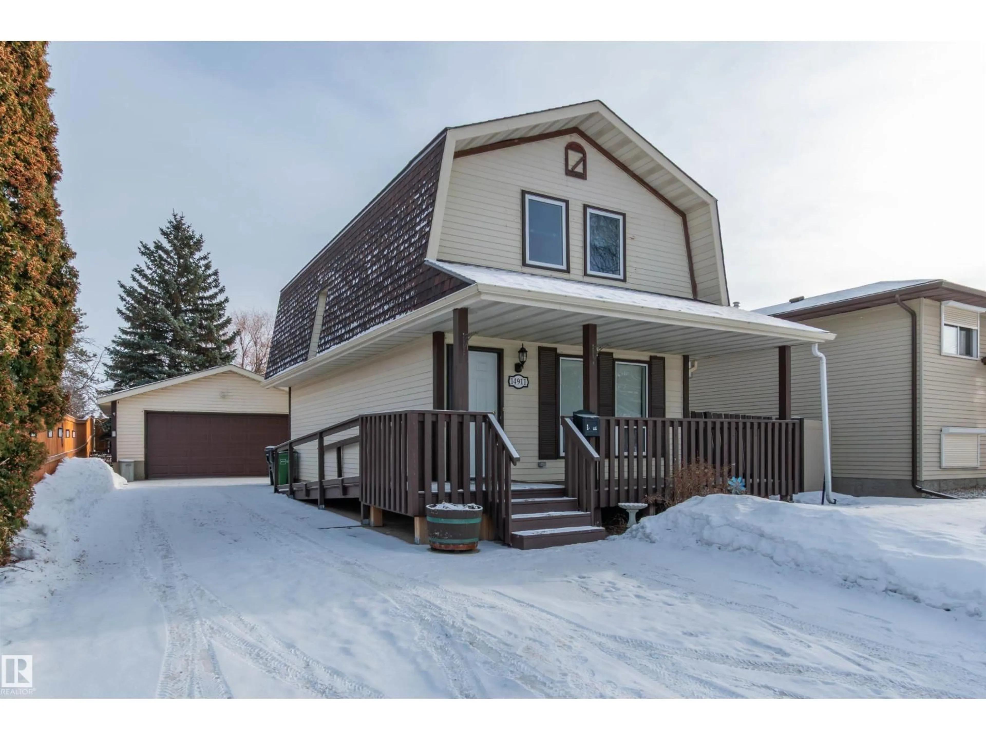 Home with vinyl exterior material, street for NW - 14911 29 ST, Edmonton Alberta T5Y2H3