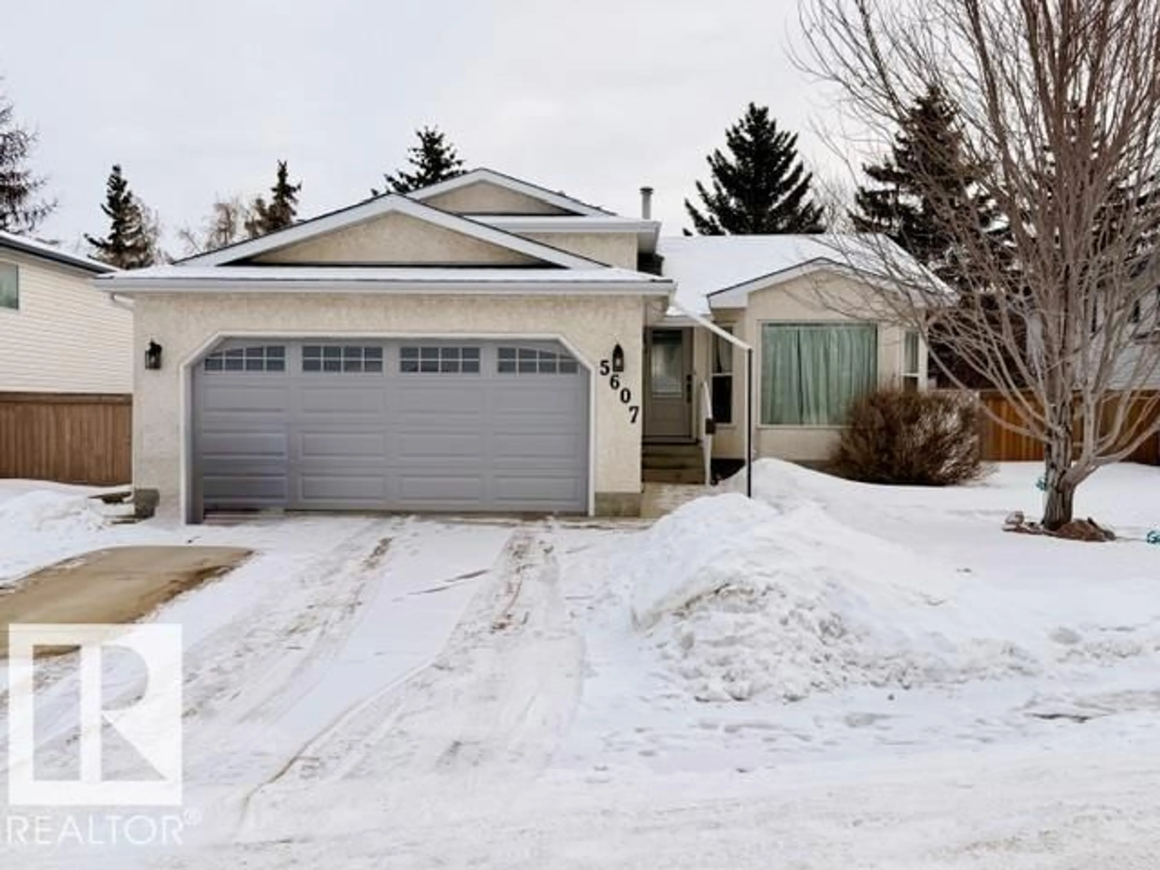 Home with vinyl exterior material, street for 5607 54 ST, Beaumont Alberta T4X1L7
