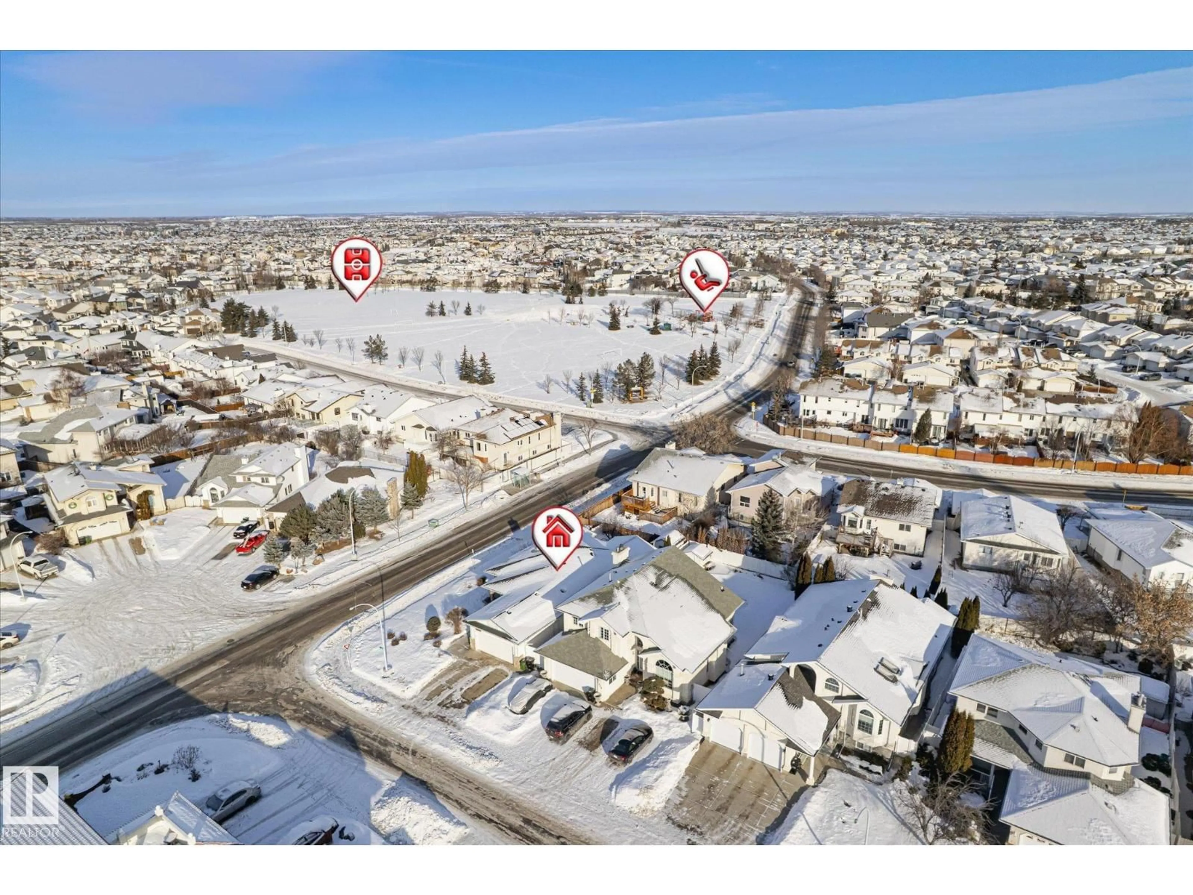 A pic from outside/outdoor area/front of a property/back of a property/a pic from drone, street for 7020 157 AV, Edmonton Alberta T5Z2Z4