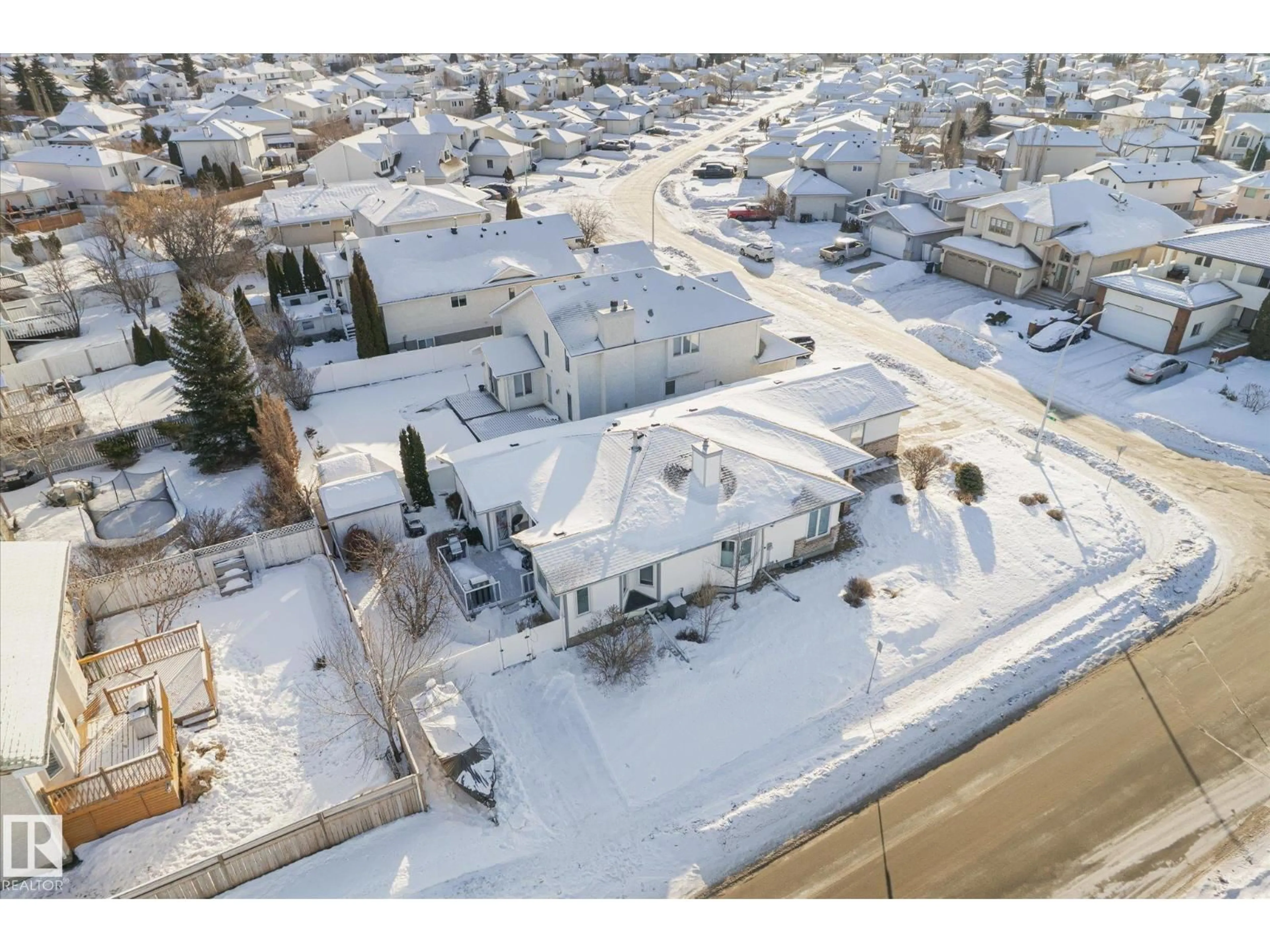 A pic from outside/outdoor area/front of a property/back of a property/a pic from drone, street for 7020 157 AV, Edmonton Alberta T5Z2Z4
