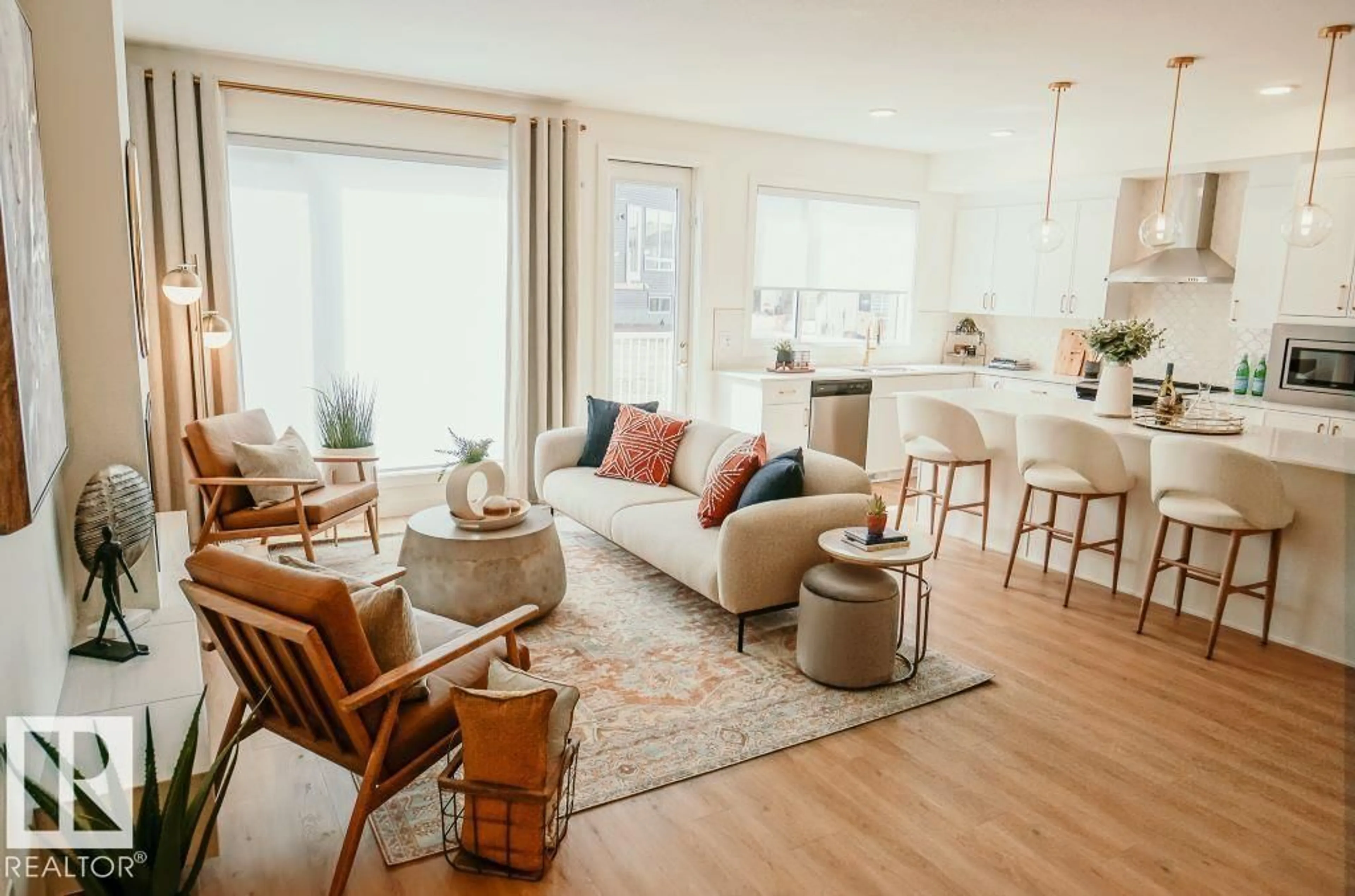 Living room with furniture, wood/laminate floor for SW - 3035 5 AV, Edmonton Alberta T6X1A5