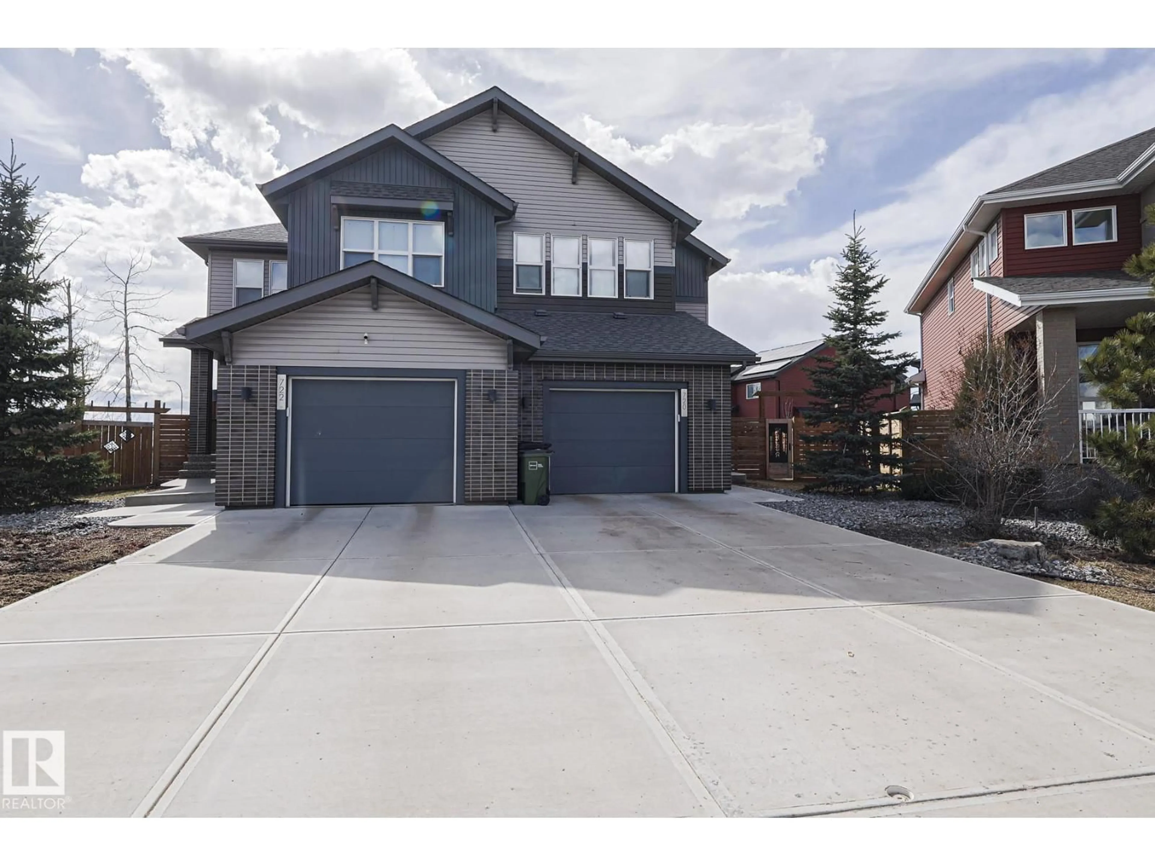 Home with brick exterior material, street for 720 CHARLESWORTH WY, Edmonton Alberta T6X2E9