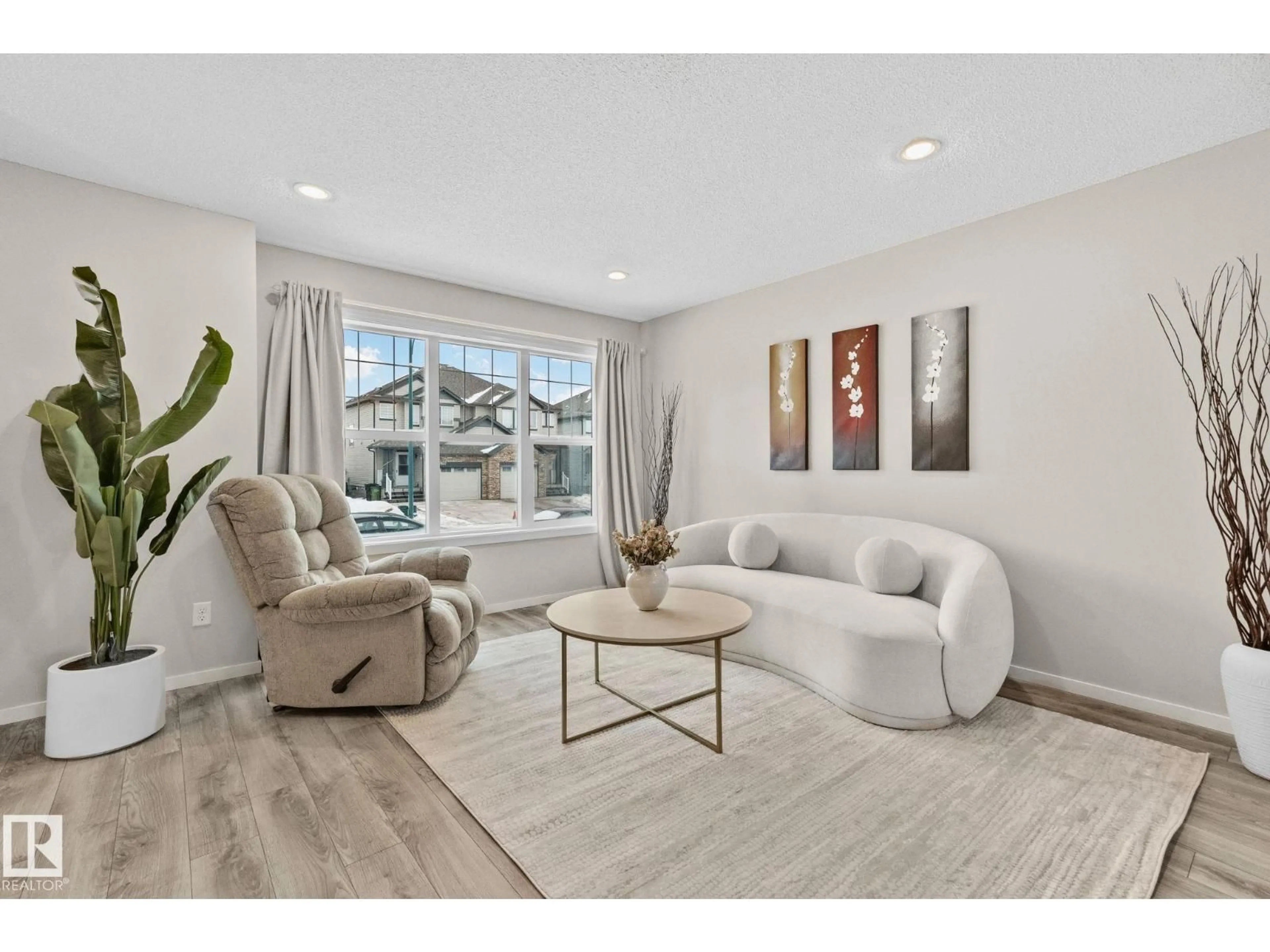 Living room with furniture, unknown for 2830 18A AV, Edmonton Alberta T6T0N8