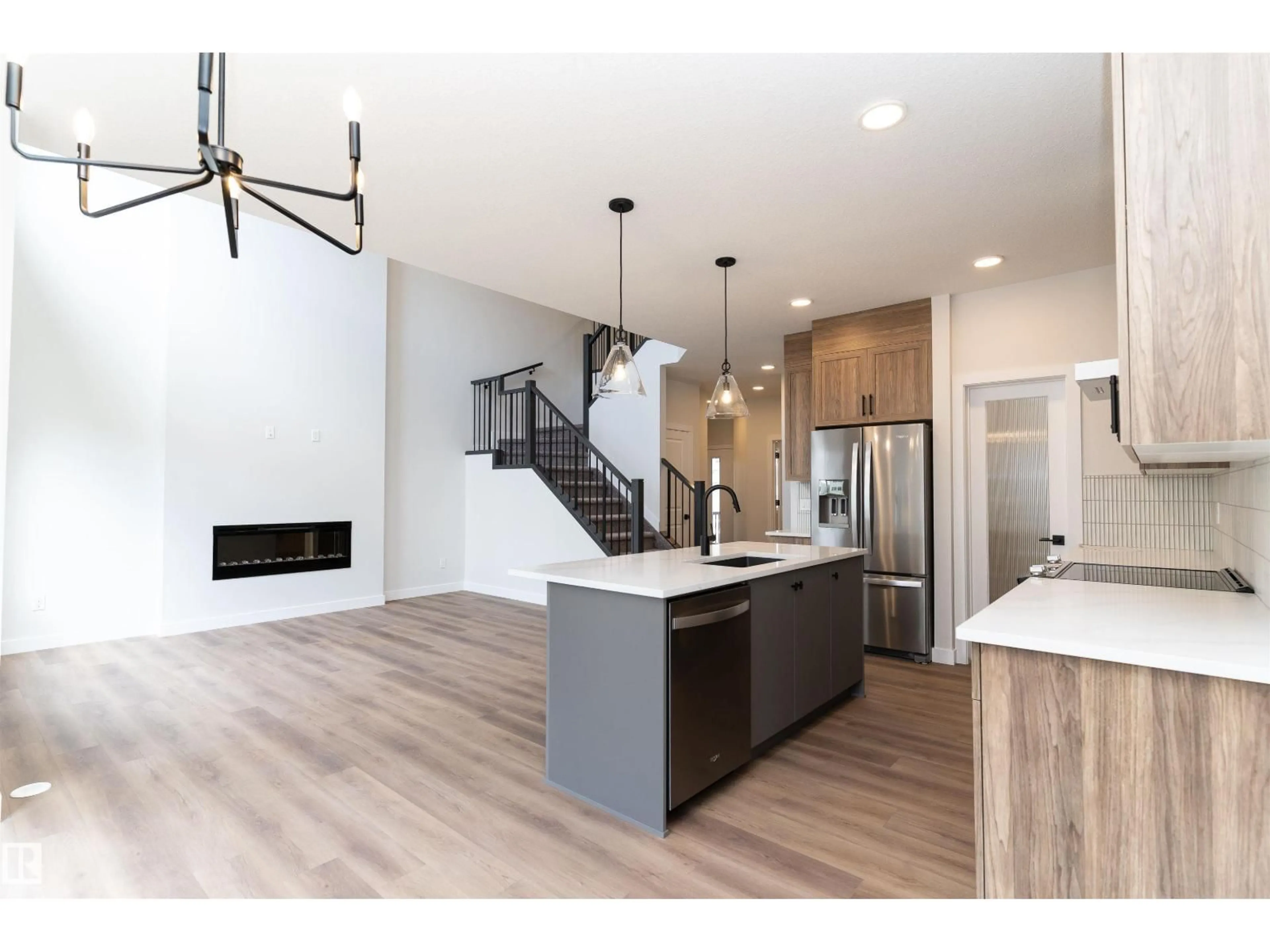 Open concept kitchen, wood/laminate floor for 3026 DIXON LD, Edmonton Alberta T6W5L1