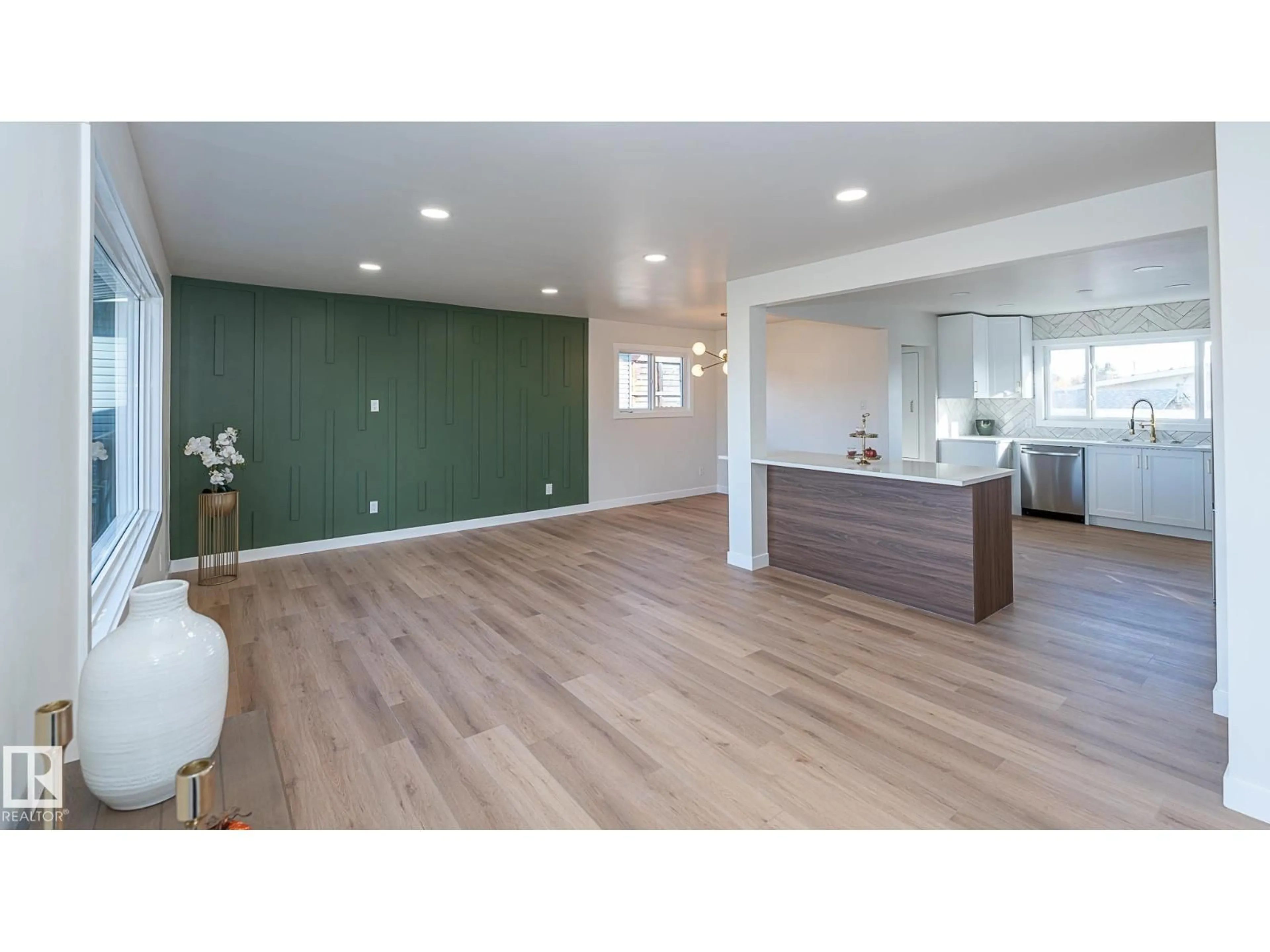 Open concept kitchen, wood/laminate floor for 6807 98A AV, Edmonton Alberta T6A0B9