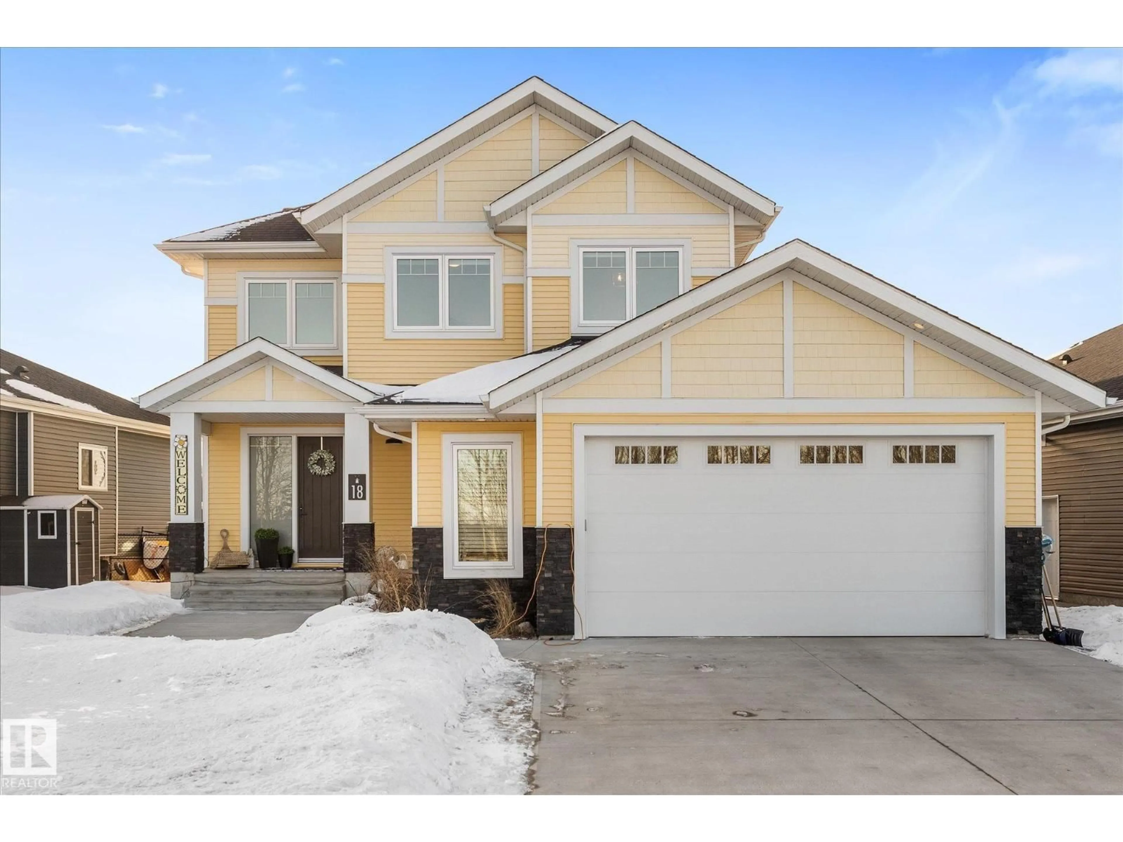 Home with vinyl exterior material, street for 18 - 3410 STE. ANNE TR, Rural Lac Ste. Anne County Alberta T0E0A0