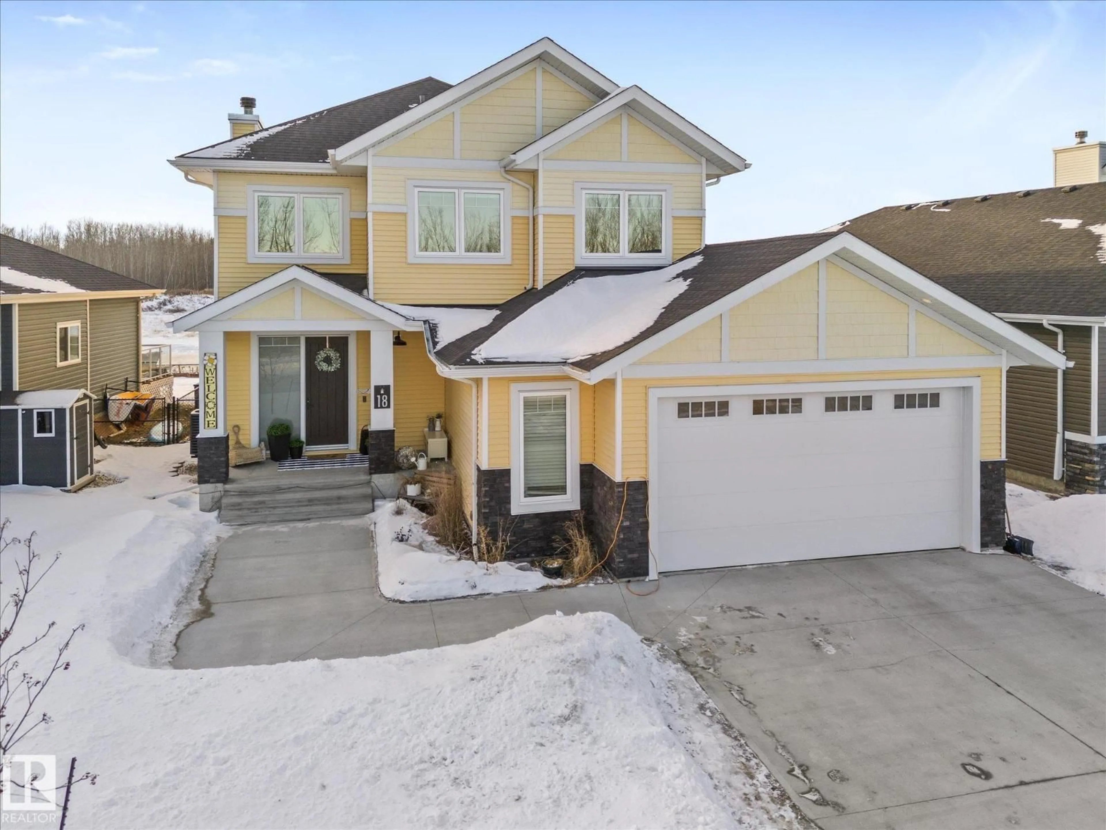 Home with vinyl exterior material, street for 18 - 3410 STE. ANNE TR, Rural Lac Ste. Anne County Alberta T0E0A0