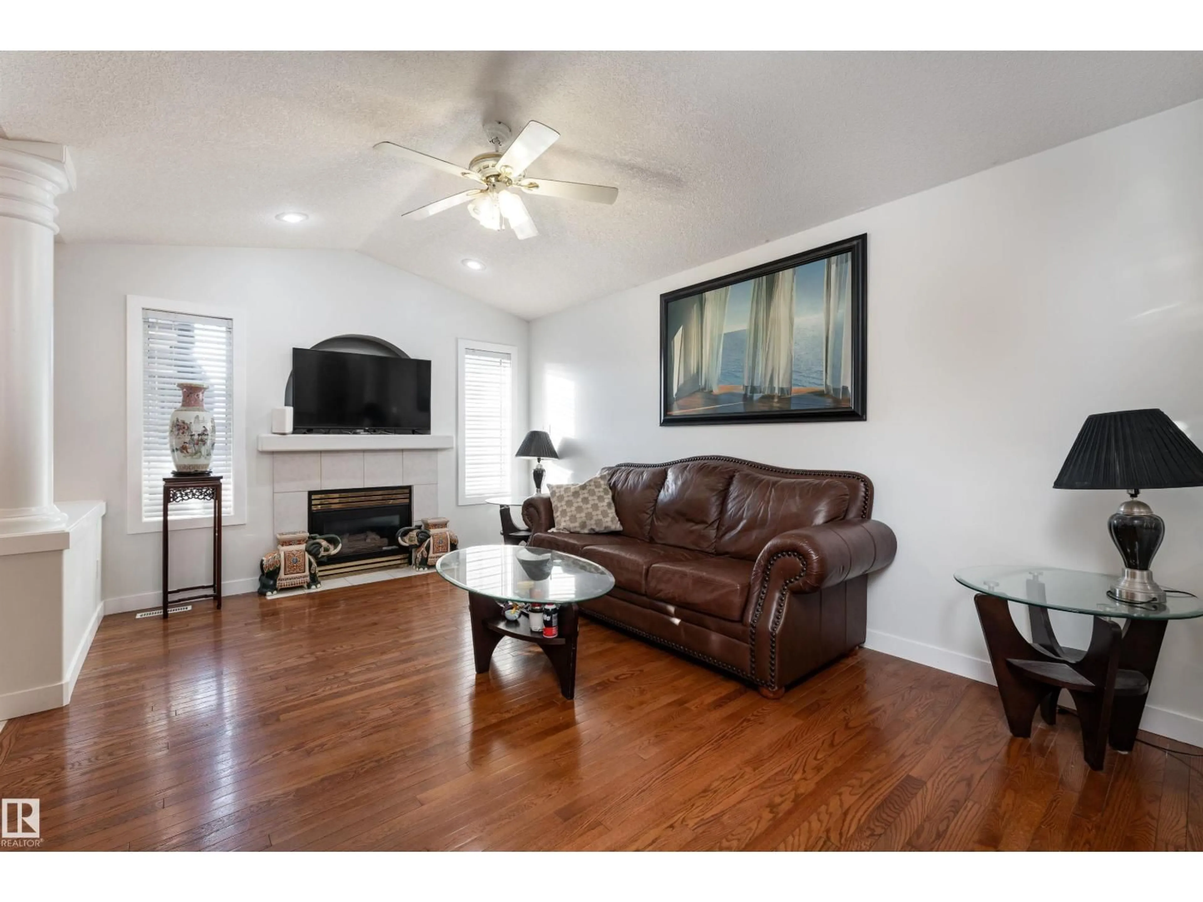 Living room with furniture, wood/laminate floor for 948 ORMSBY WD, Edmonton Alberta T5T6B1