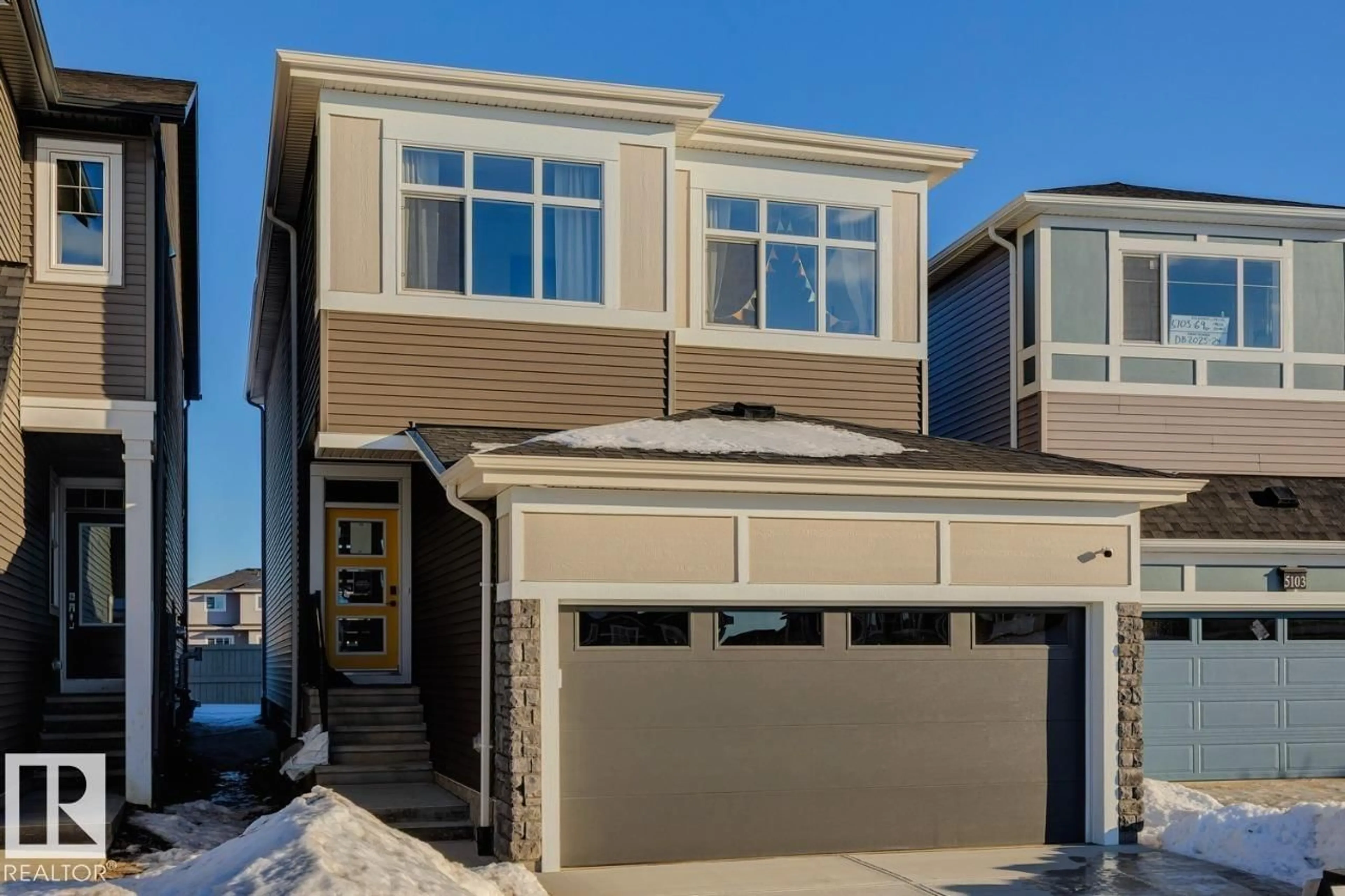 Home with vinyl exterior material, street for 5105 69 ST, Beaumont Alberta T4X3E4