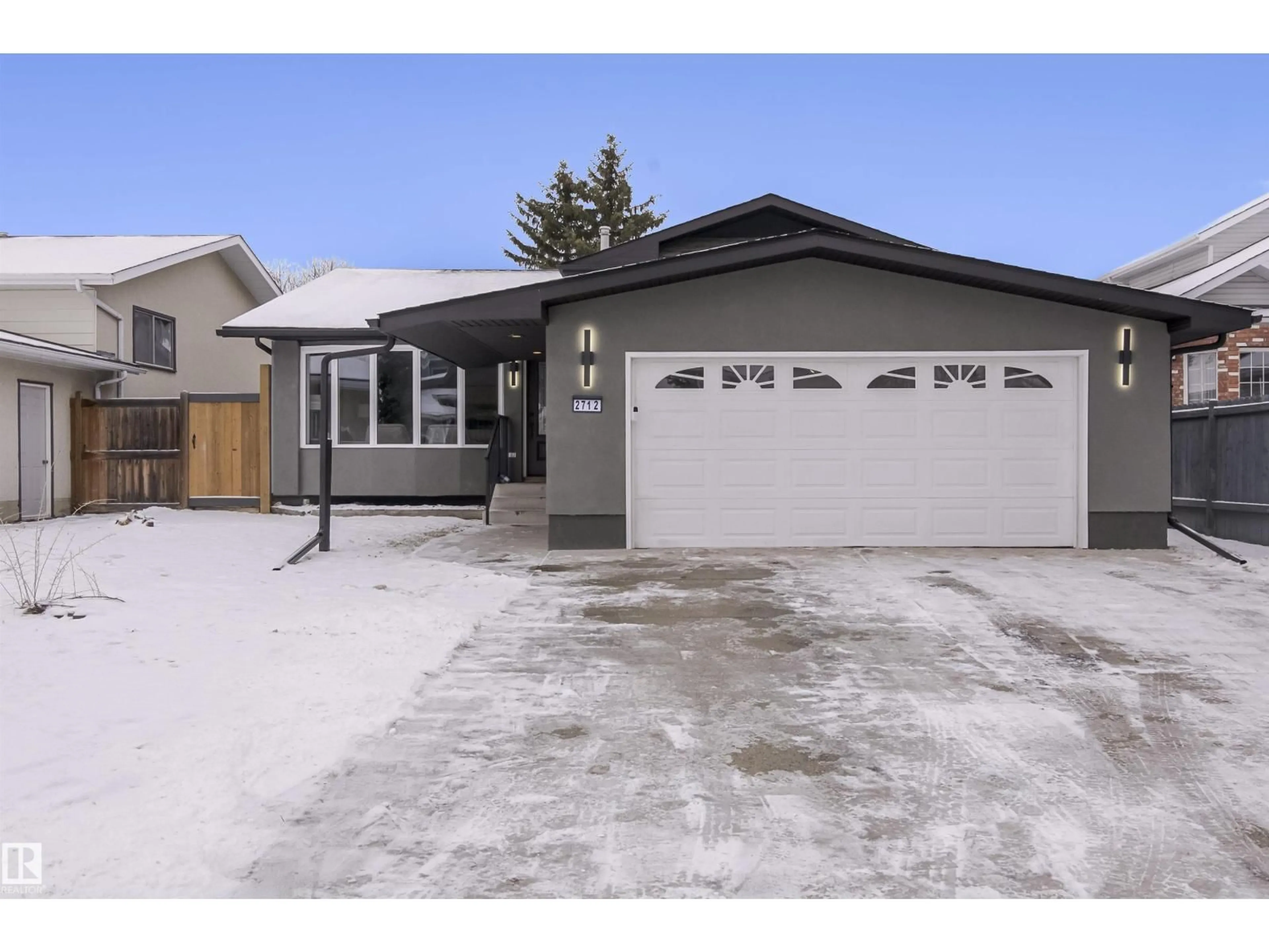 Home with vinyl exterior material, street for 2712 41 ST, Edmonton Alberta T6L4H1