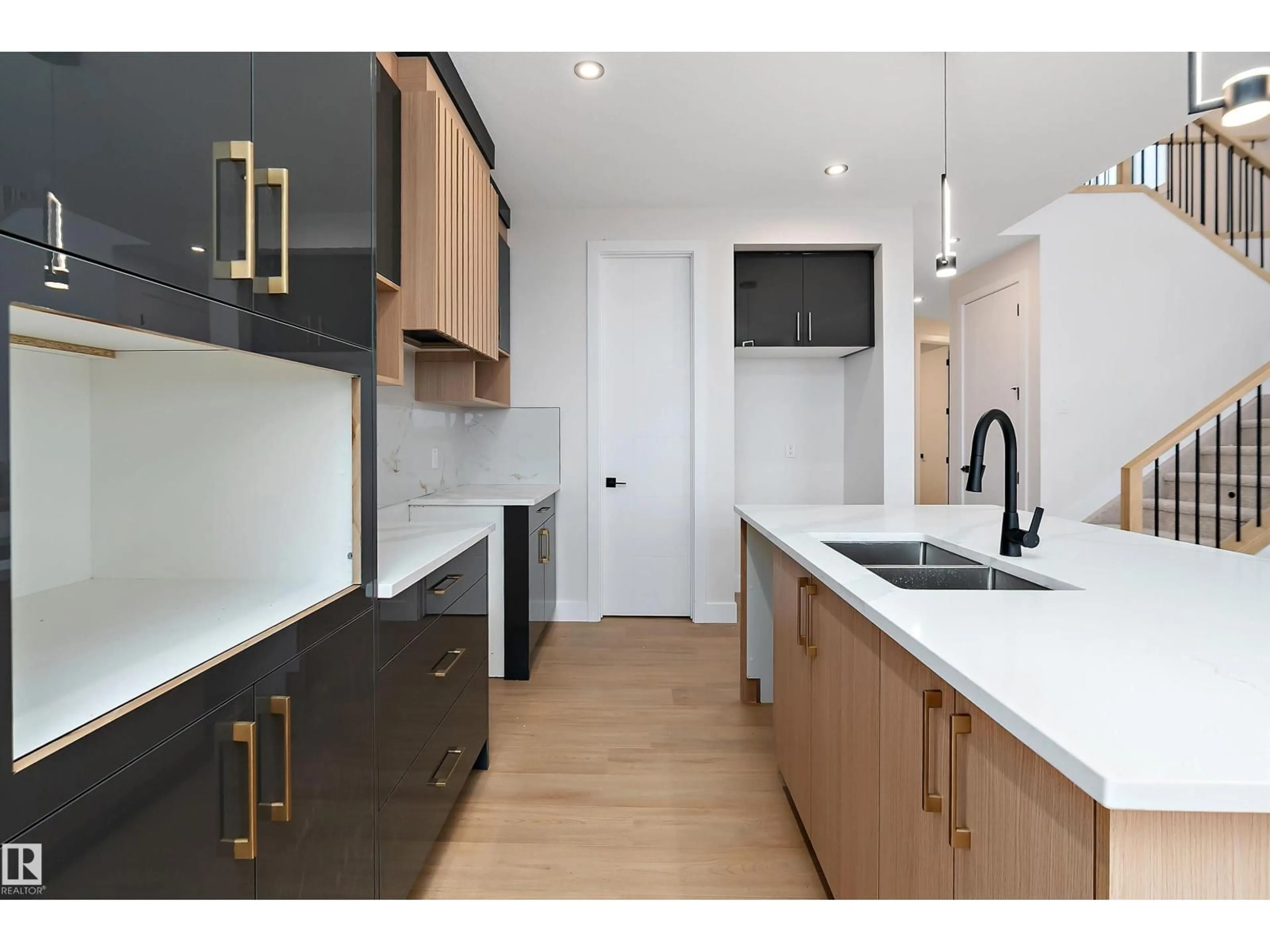 Open concept kitchen, wood/laminate floor for 38 ASTORIA PL, Devon Alberta T9G0M7