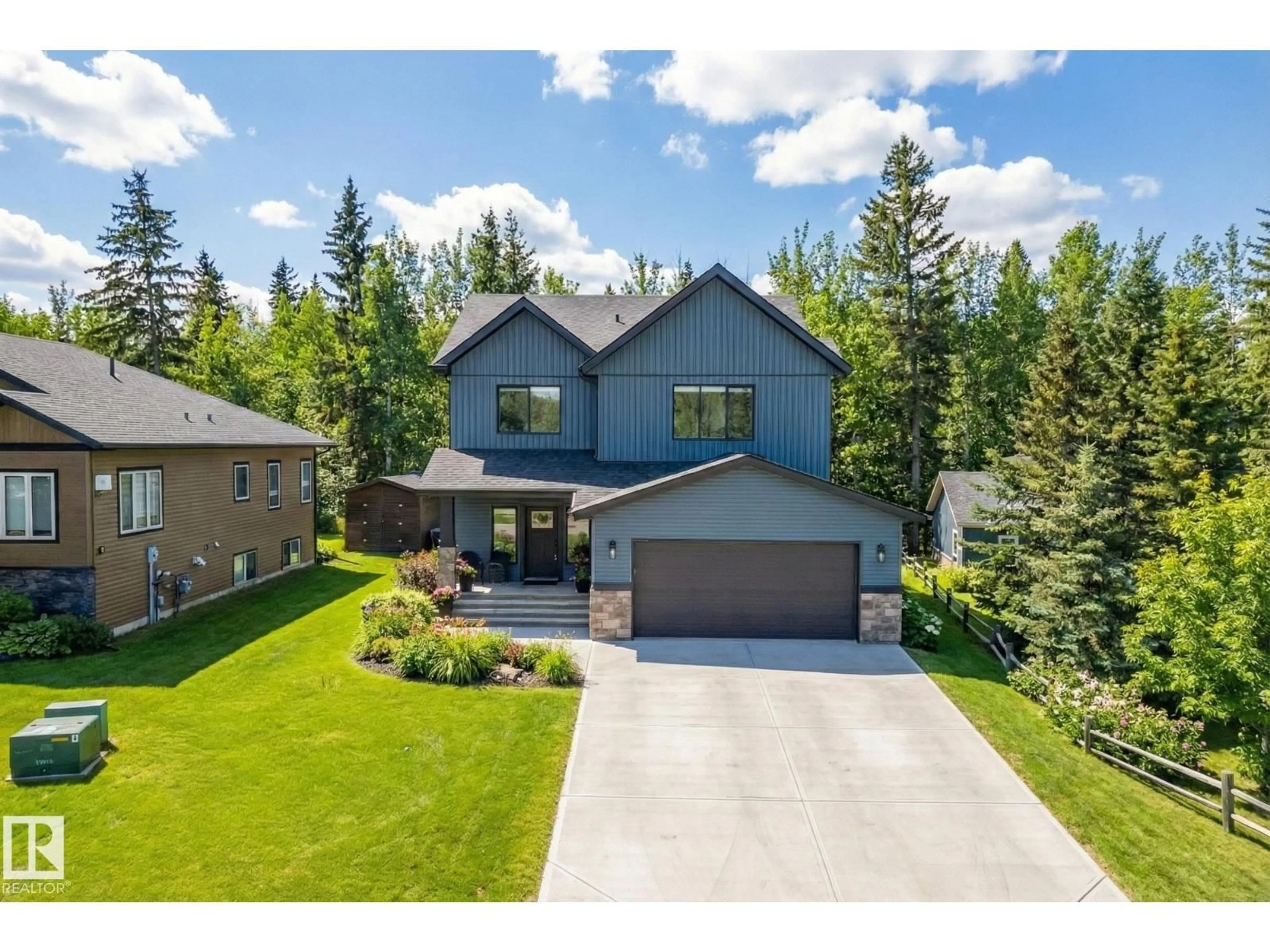 A pic from outside/outdoor area/front of a property/back of a property/a pic from drone, unknown for 132 HERON POINT CL, Rural Wetaskiwin County Alberta T0C2V0