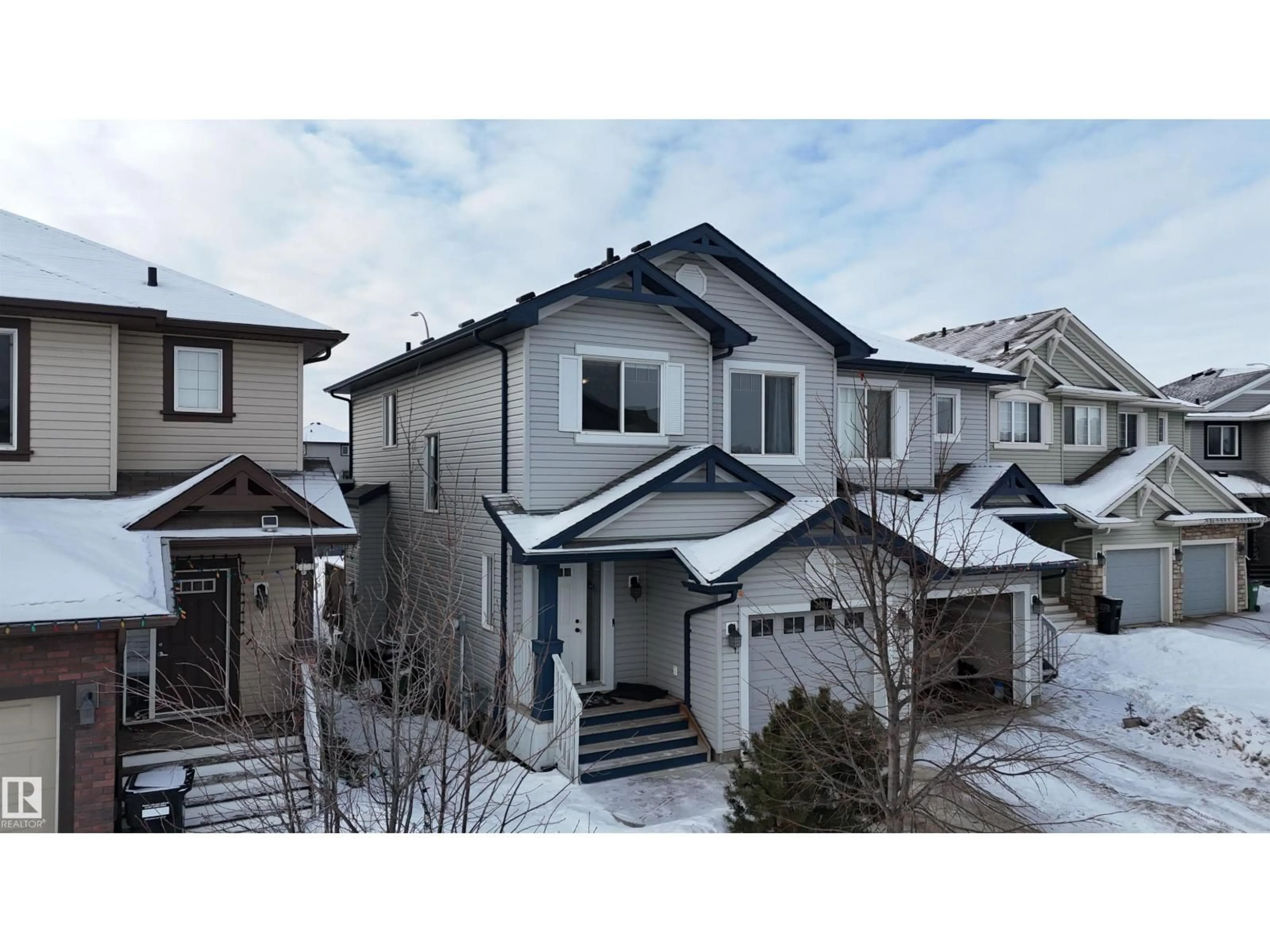 A pic from outside/outdoor area/front of a property/back of a property/a pic from drone, street for 3921 167A AV, Edmonton Alberta T5Y0X9