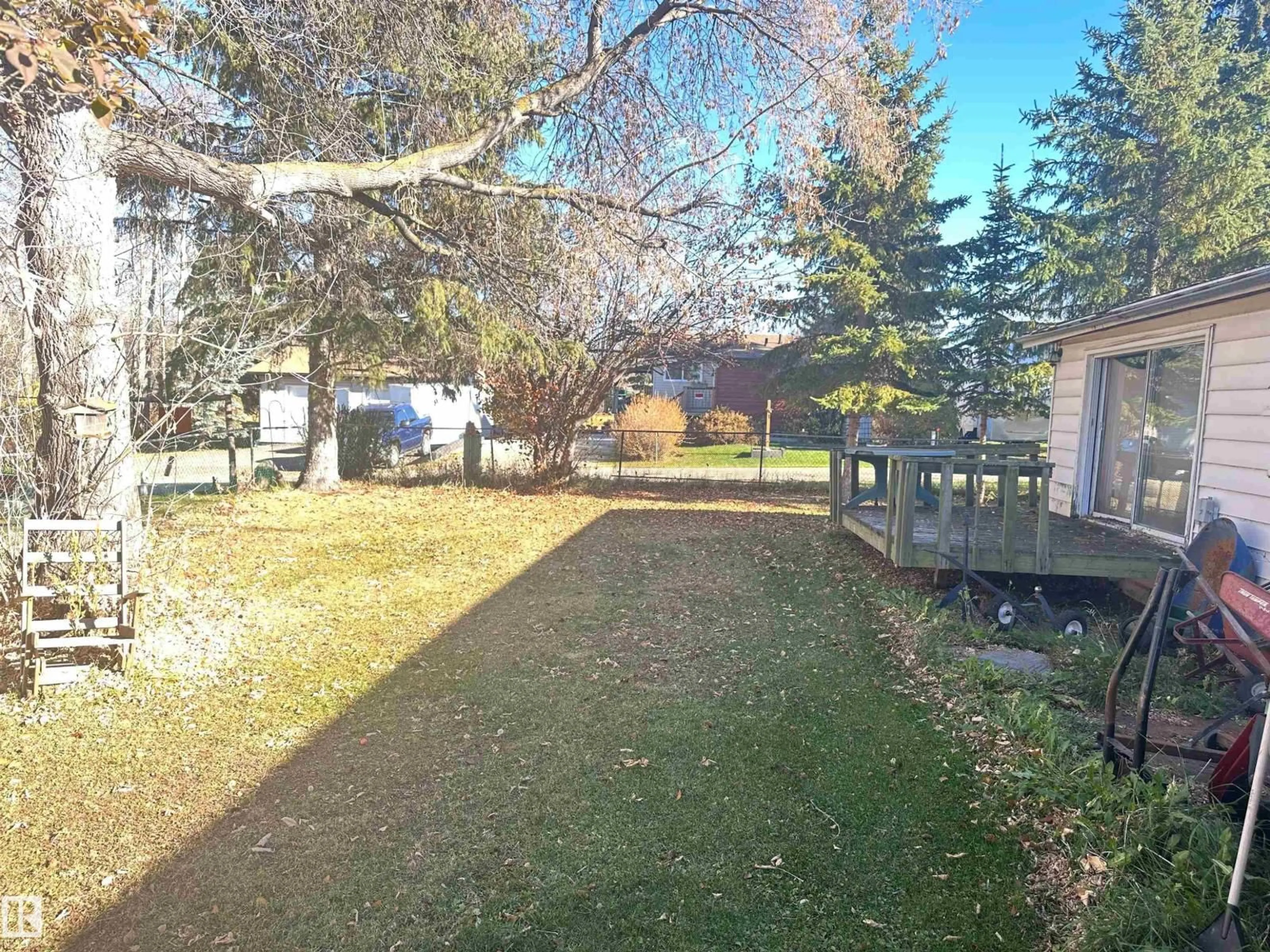 A pic from outside/outdoor area/front of a property/back of a property/a pic from drone, street for #22 - 20575 WYE RD, Rural Strathcona County Alberta T8G1H1