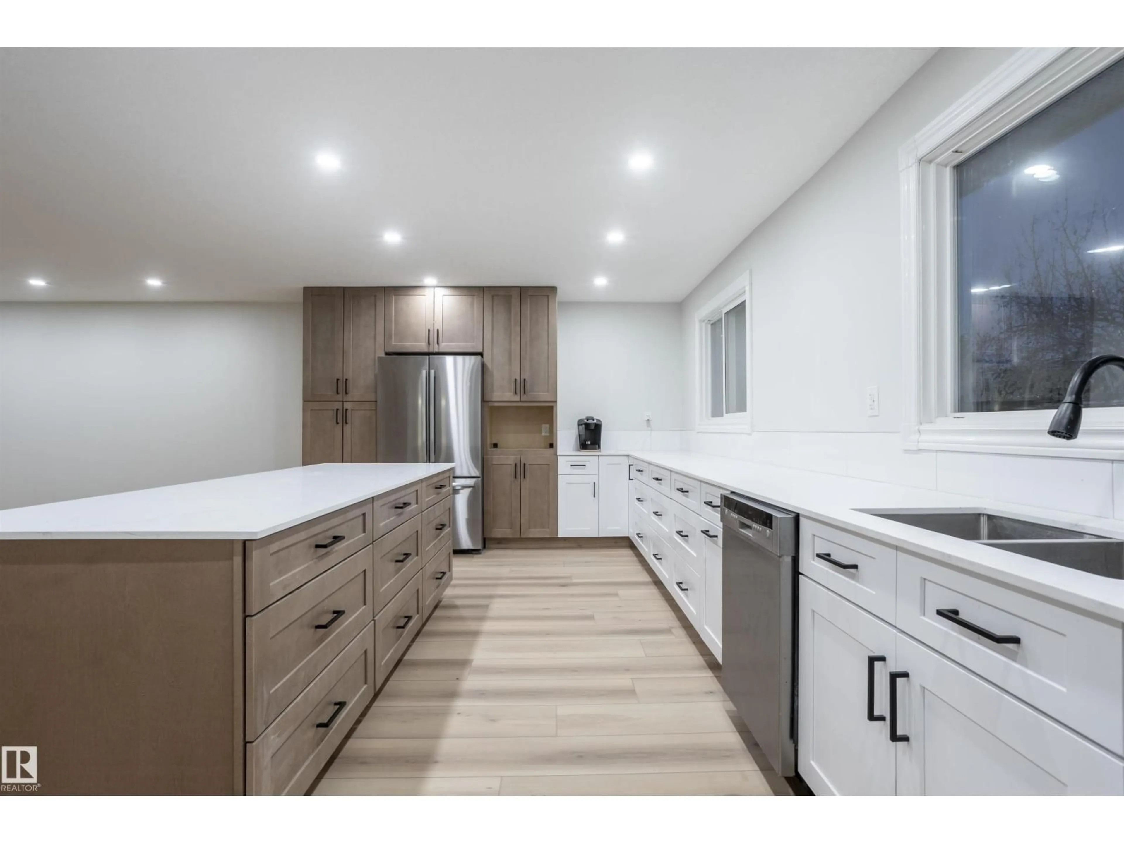 Open concept kitchen, wood/laminate floor for 47 MANOR DR, Sherwood Park Alberta T8A0P9
