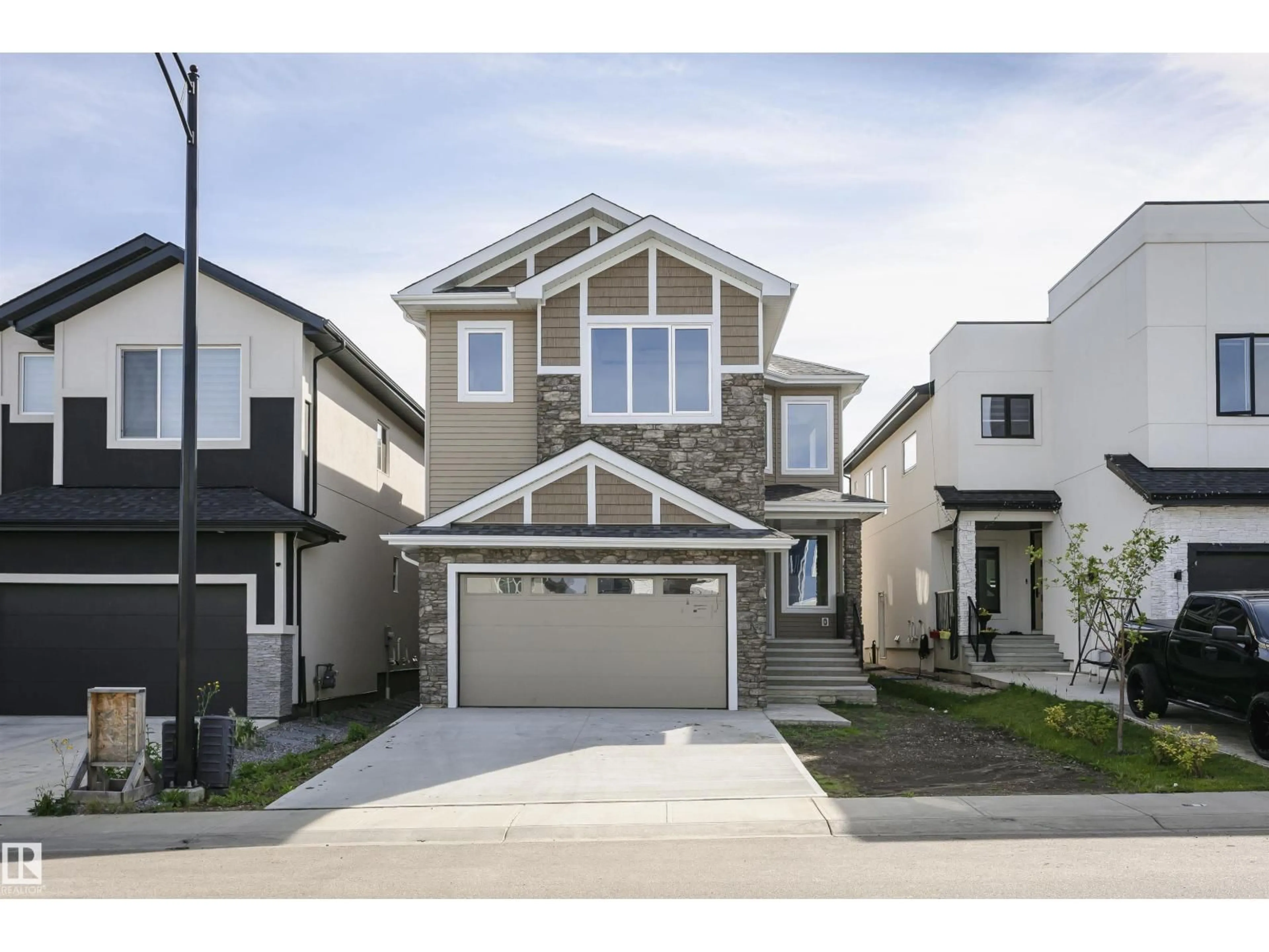 Home with vinyl exterior material, street for NW - 1723 19 ST, Edmonton Alberta T6T2N1