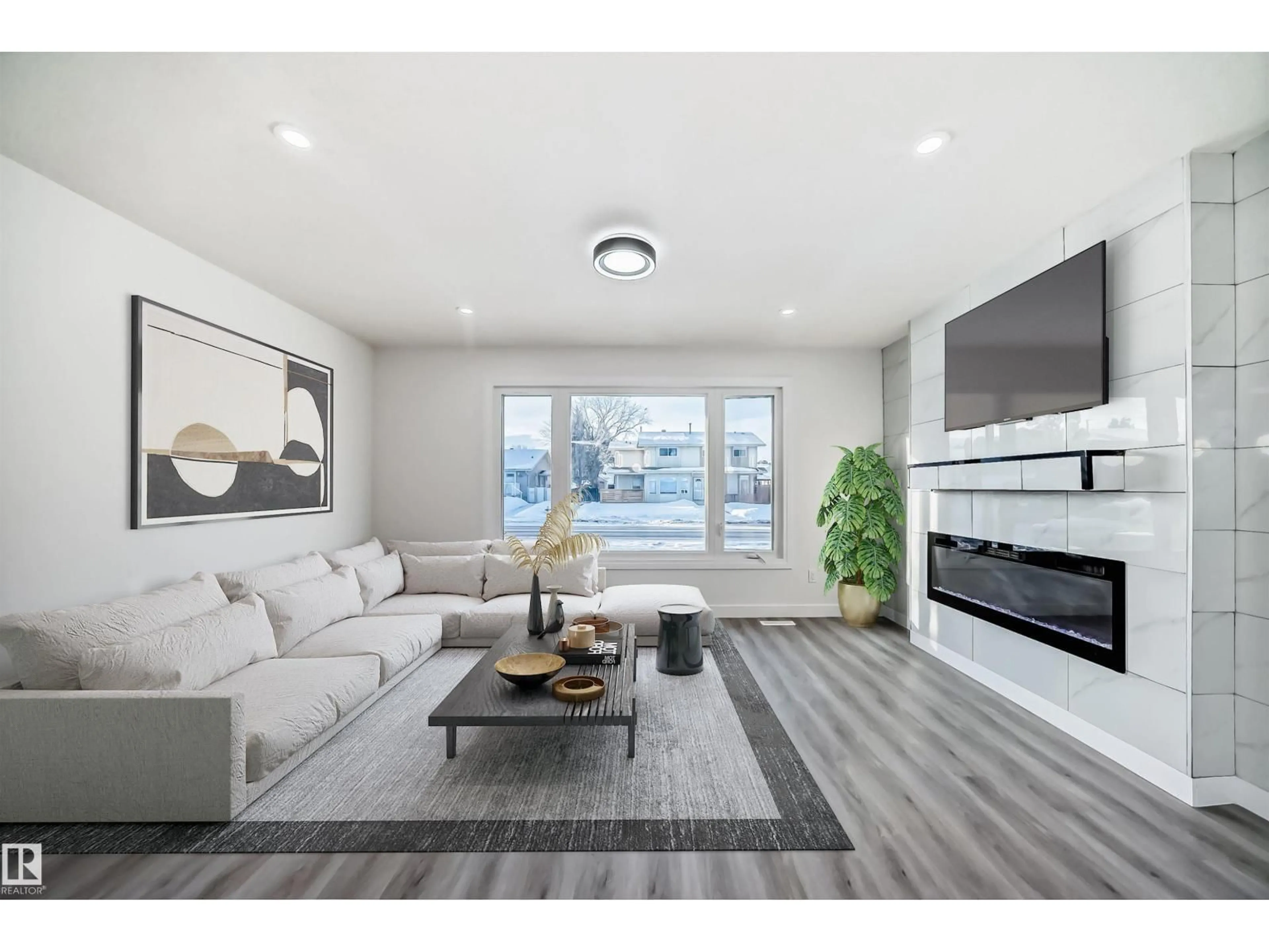 Living room with furniture, wood/laminate floor for NW - 14505 23 ST, Edmonton Alberta T5Y1T4