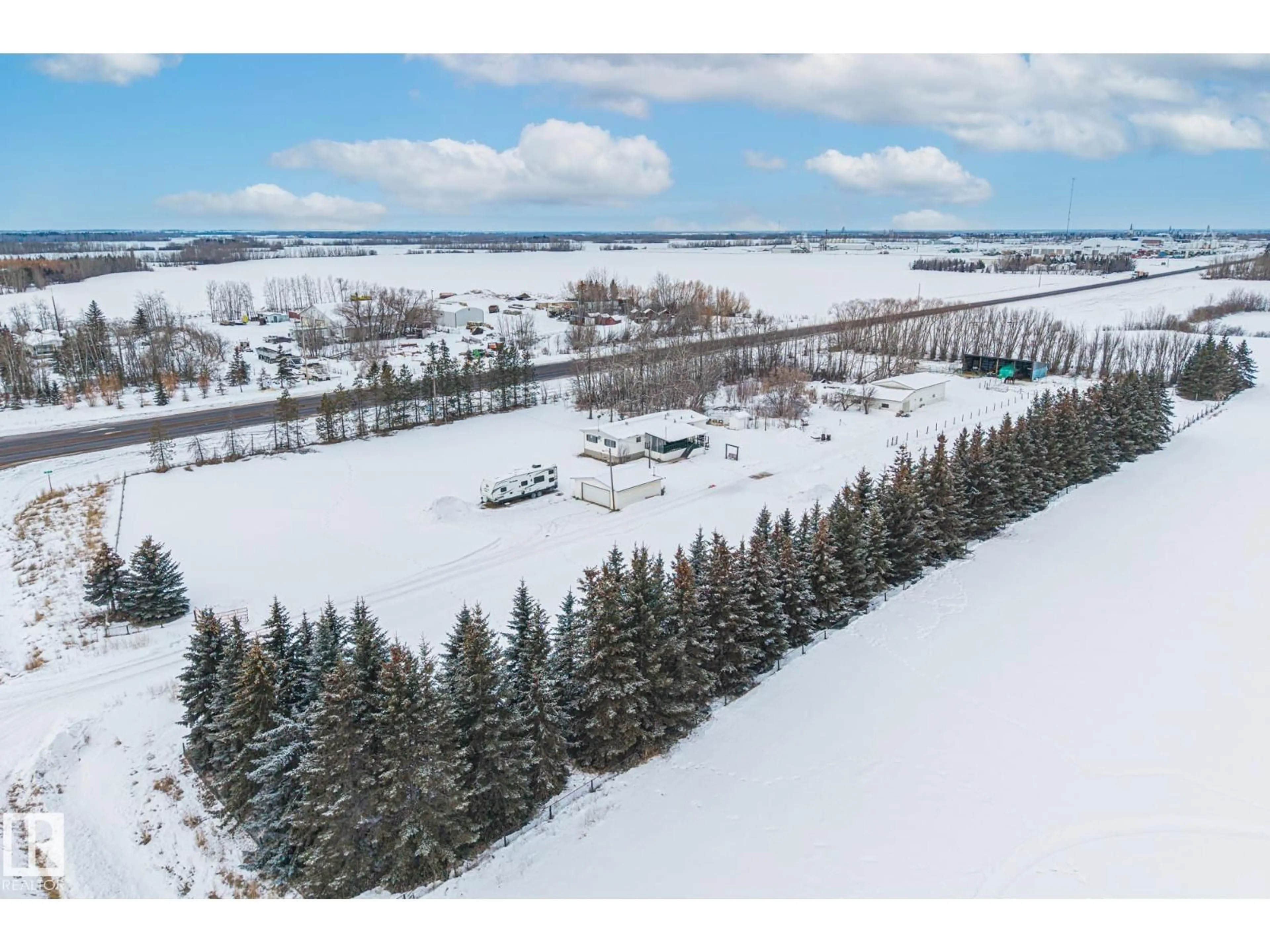 A pic from outside/outdoor area/front of a property/back of a property/a pic from drone, water/lake/river/ocean view for 26332 TWP ROAD 594, Rural Westlock County Alberta T7P2P5