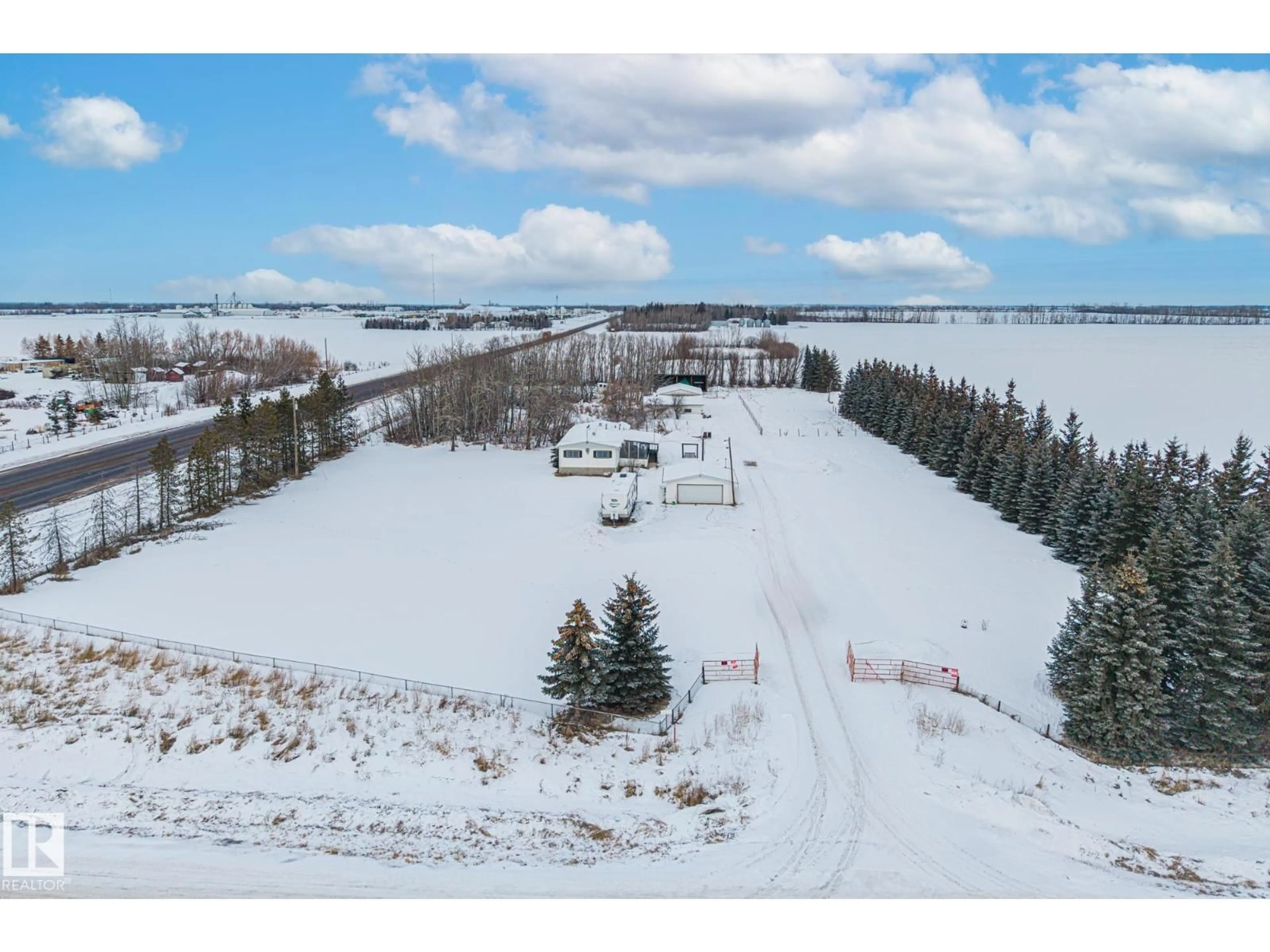 A pic from outside/outdoor area/front of a property/back of a property/a pic from drone, water/lake/river/ocean view for 26332 TWP ROAD 594, Rural Westlock County Alberta T7P2P5