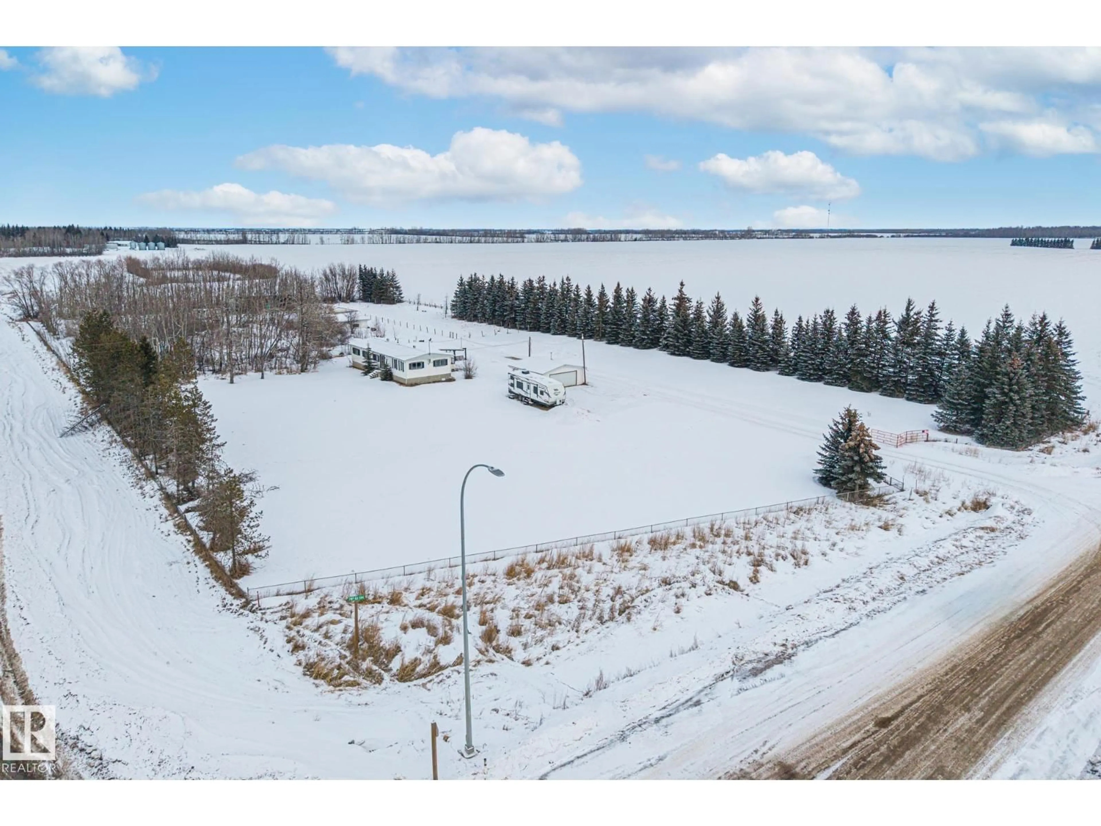 A pic from outside/outdoor area/front of a property/back of a property/a pic from drone, water/lake/river/ocean view for 26332 TWP ROAD 594, Rural Westlock County Alberta T7P2P5