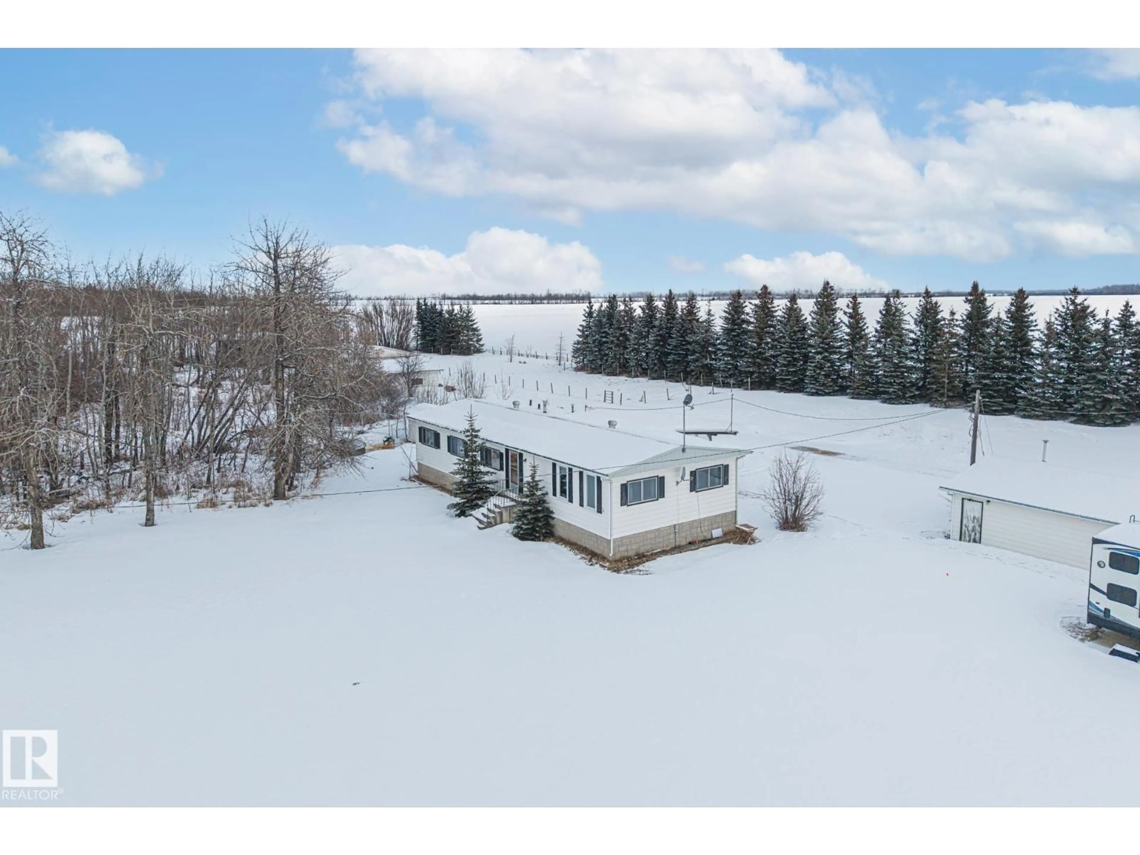 A pic from outside/outdoor area/front of a property/back of a property/a pic from drone, water/lake/river/ocean view for 26332 TWP ROAD 594, Rural Westlock County Alberta T7P2P5