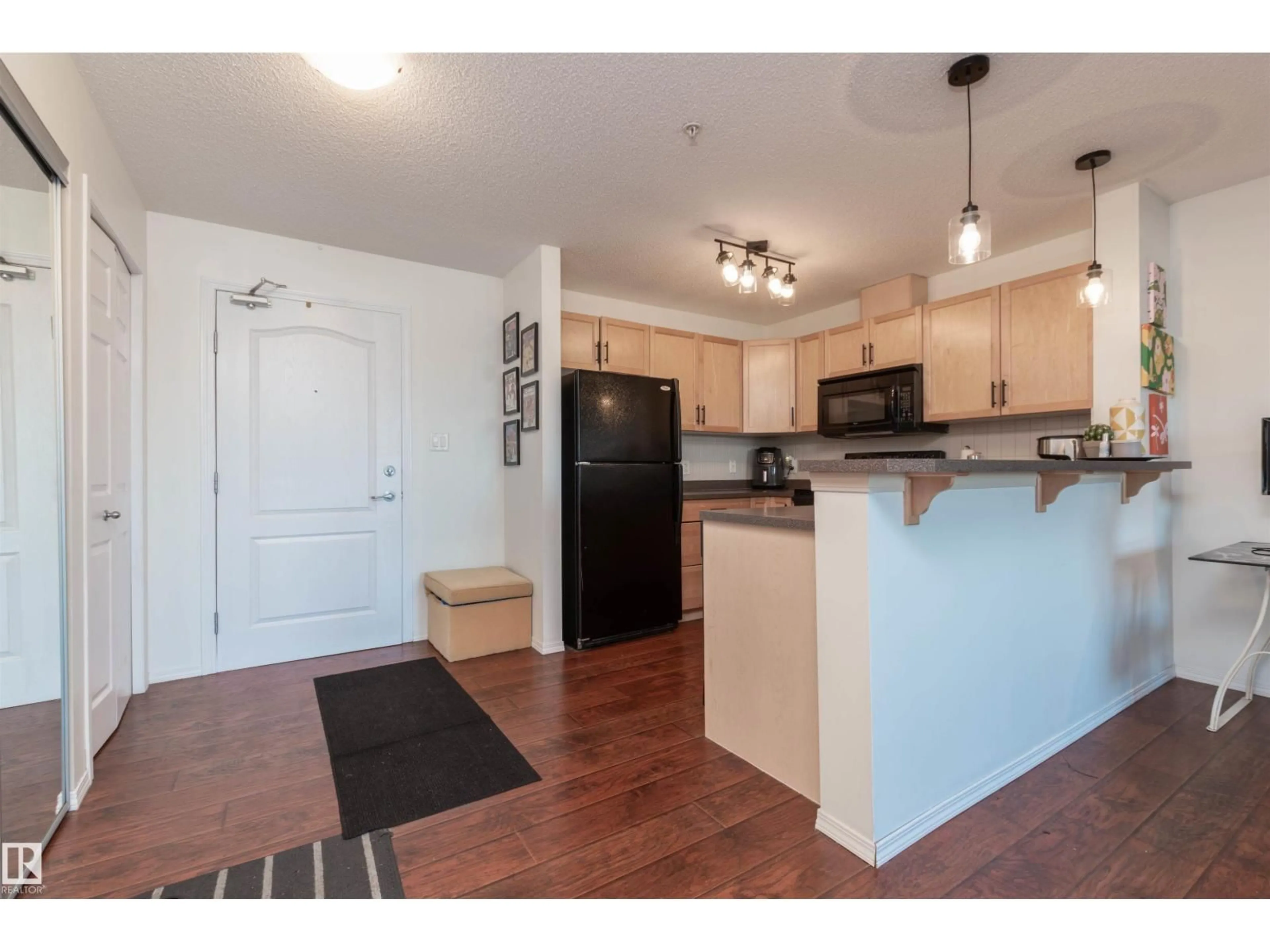 Standard kitchen, wood/laminate floor for #303 - 5951 165 AV, Edmonton Alberta T5Y0J6