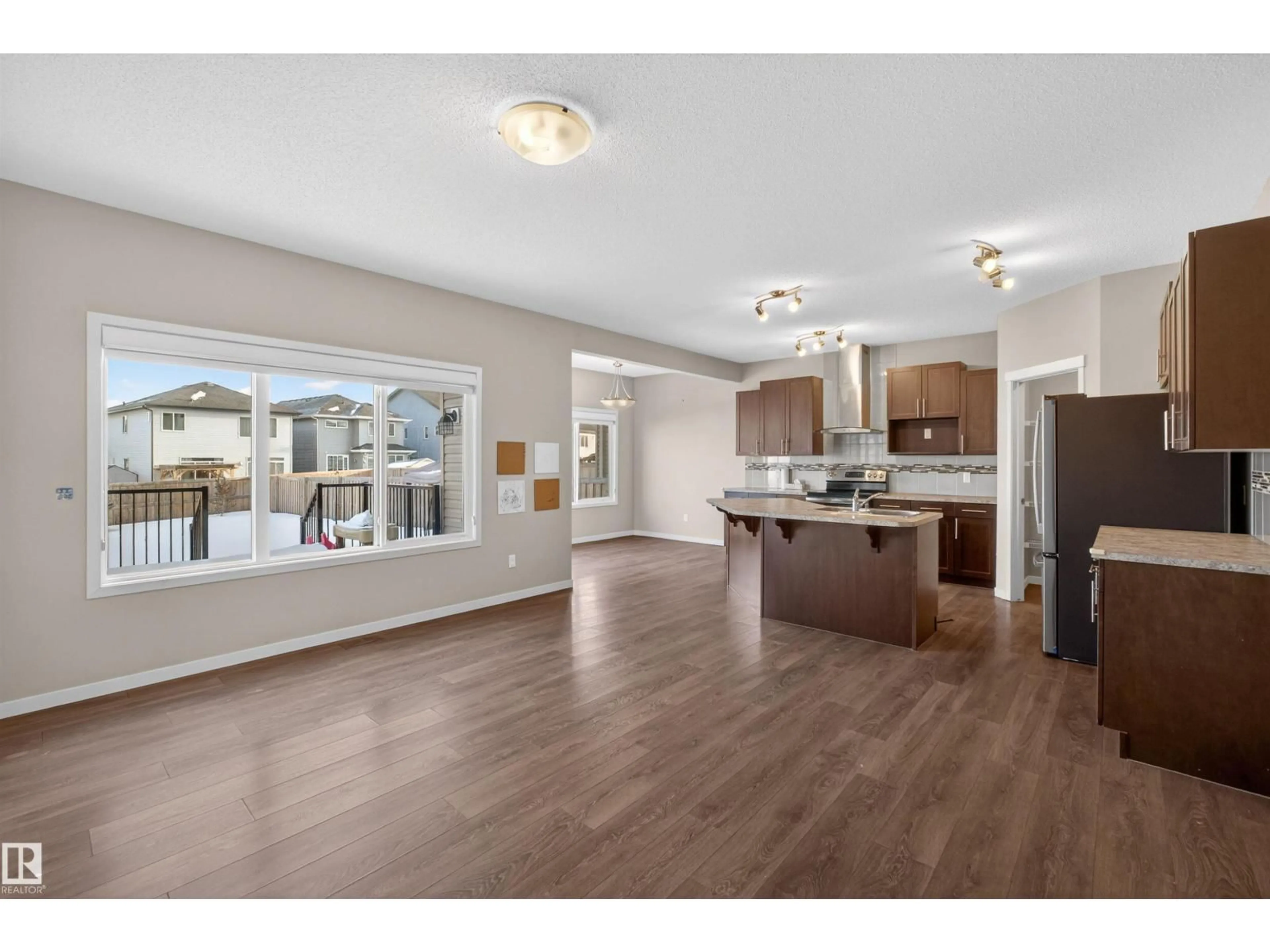 Open concept kitchen, wood/laminate floor for SW SW - 4723 ALWOOD BEND BN, Edmonton Alberta T6W3A2
