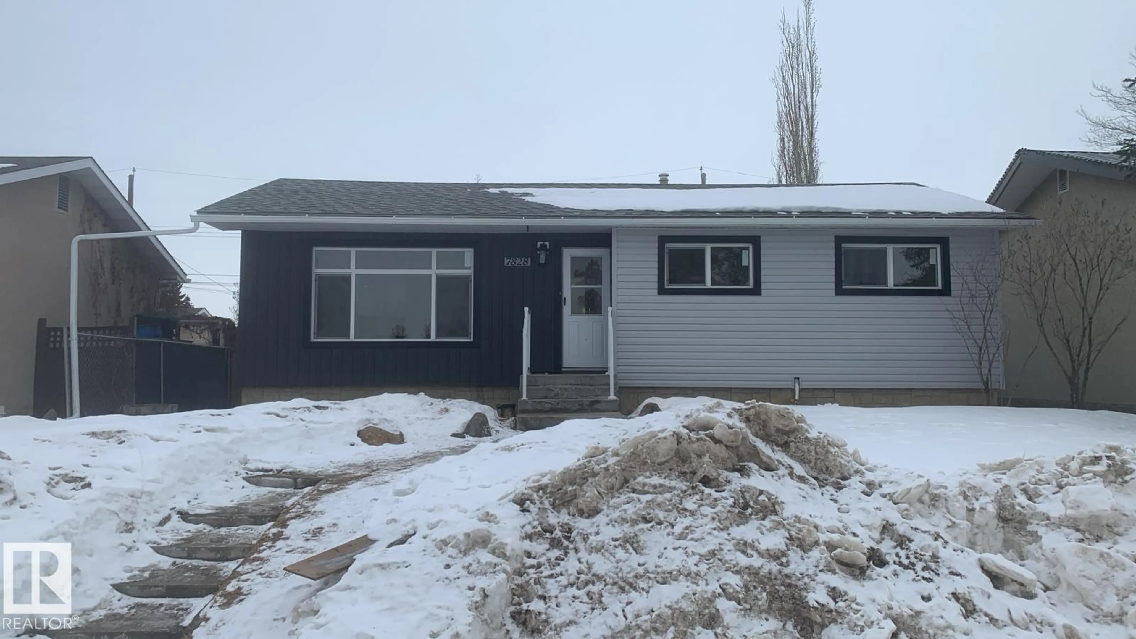 Home with vinyl exterior material, street for 7828 135A AV, Edmonton Alberta T5C2J5