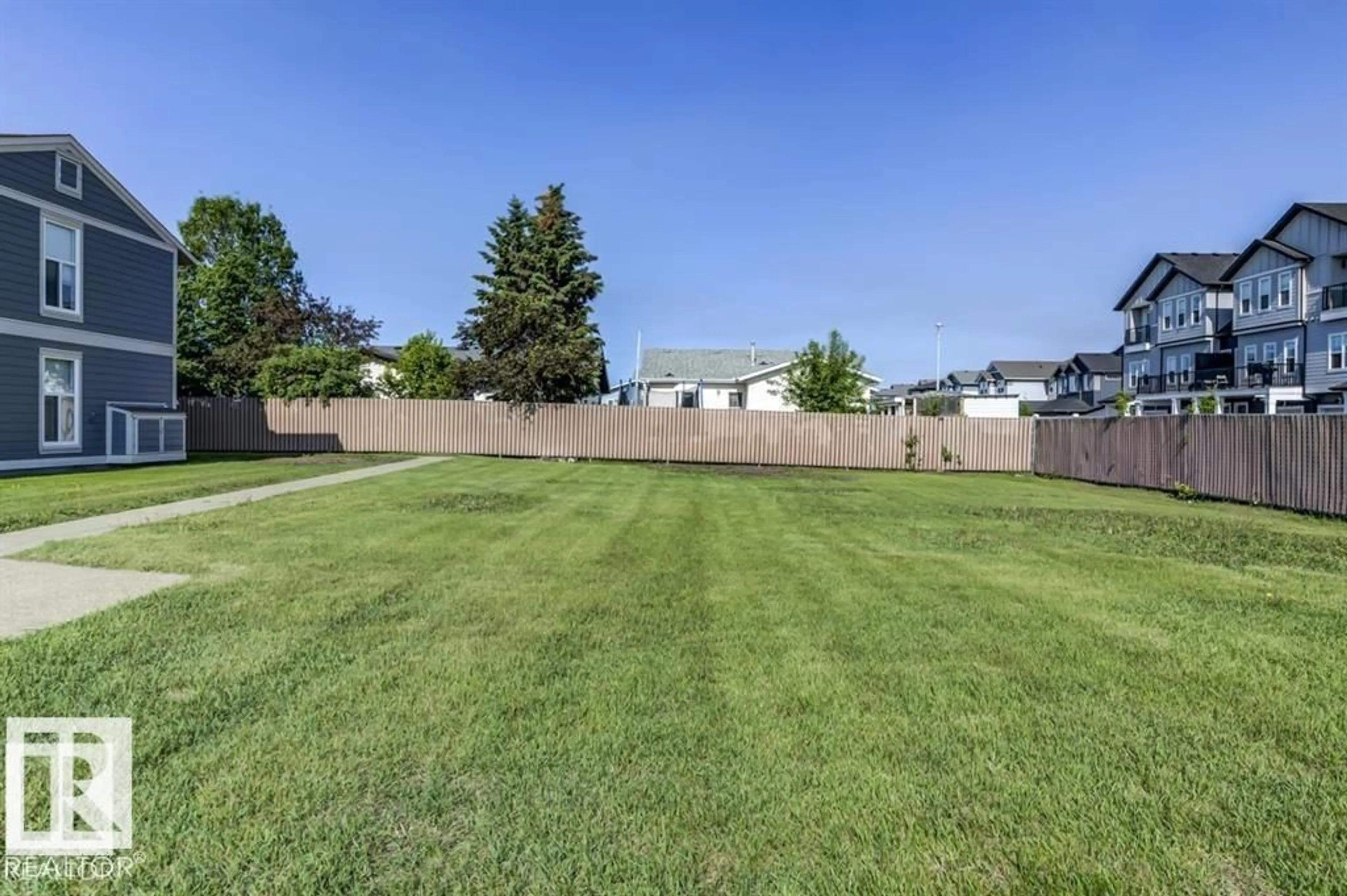 A pic from outside/outdoor area/front of a property/back of a property/a pic from drone, unknown for 2346 151 AV, Edmonton Alberta T5Y2L1