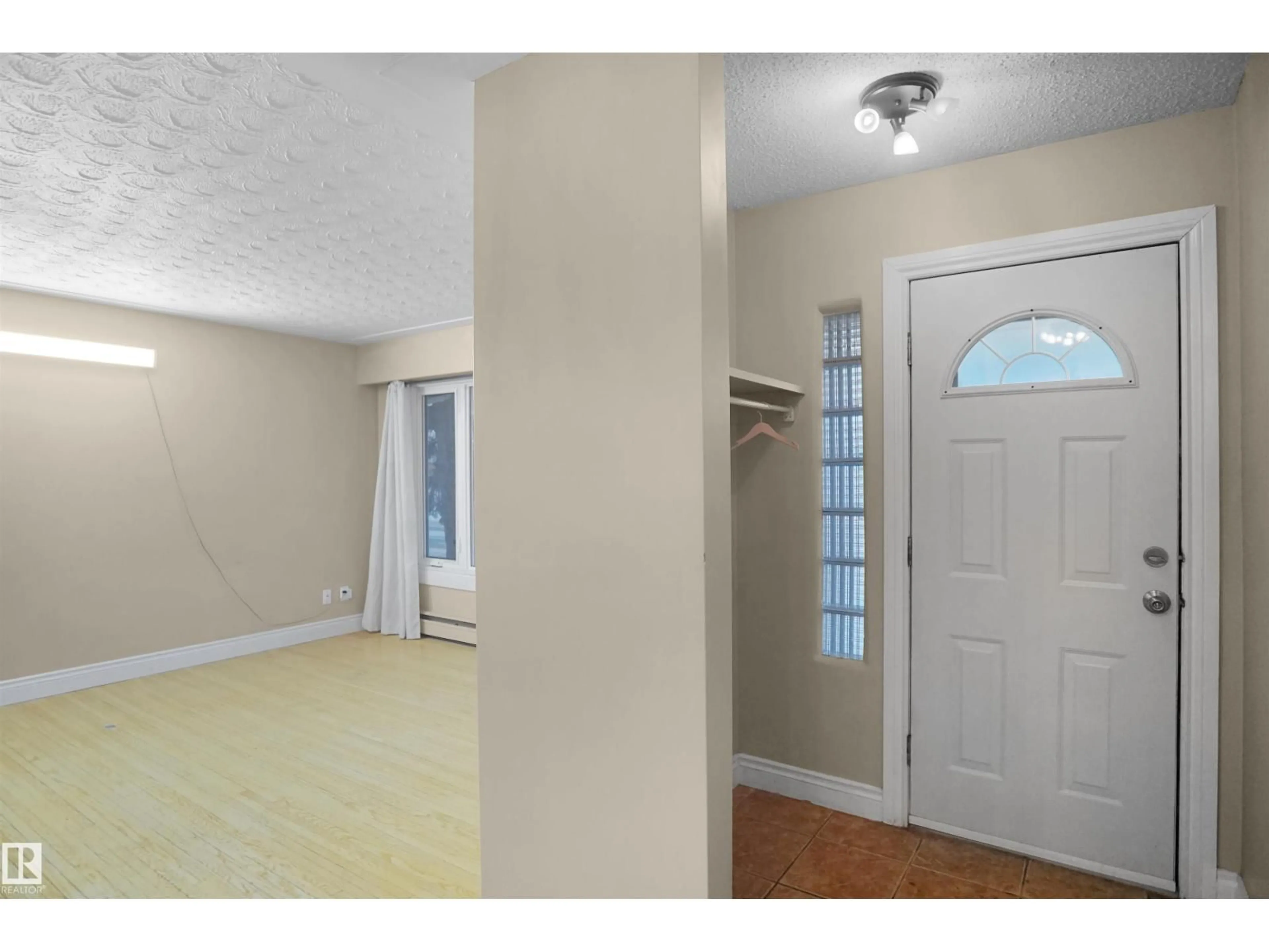Indoor entryway for 12411 132 AV, Edmonton Alberta T5L3P8