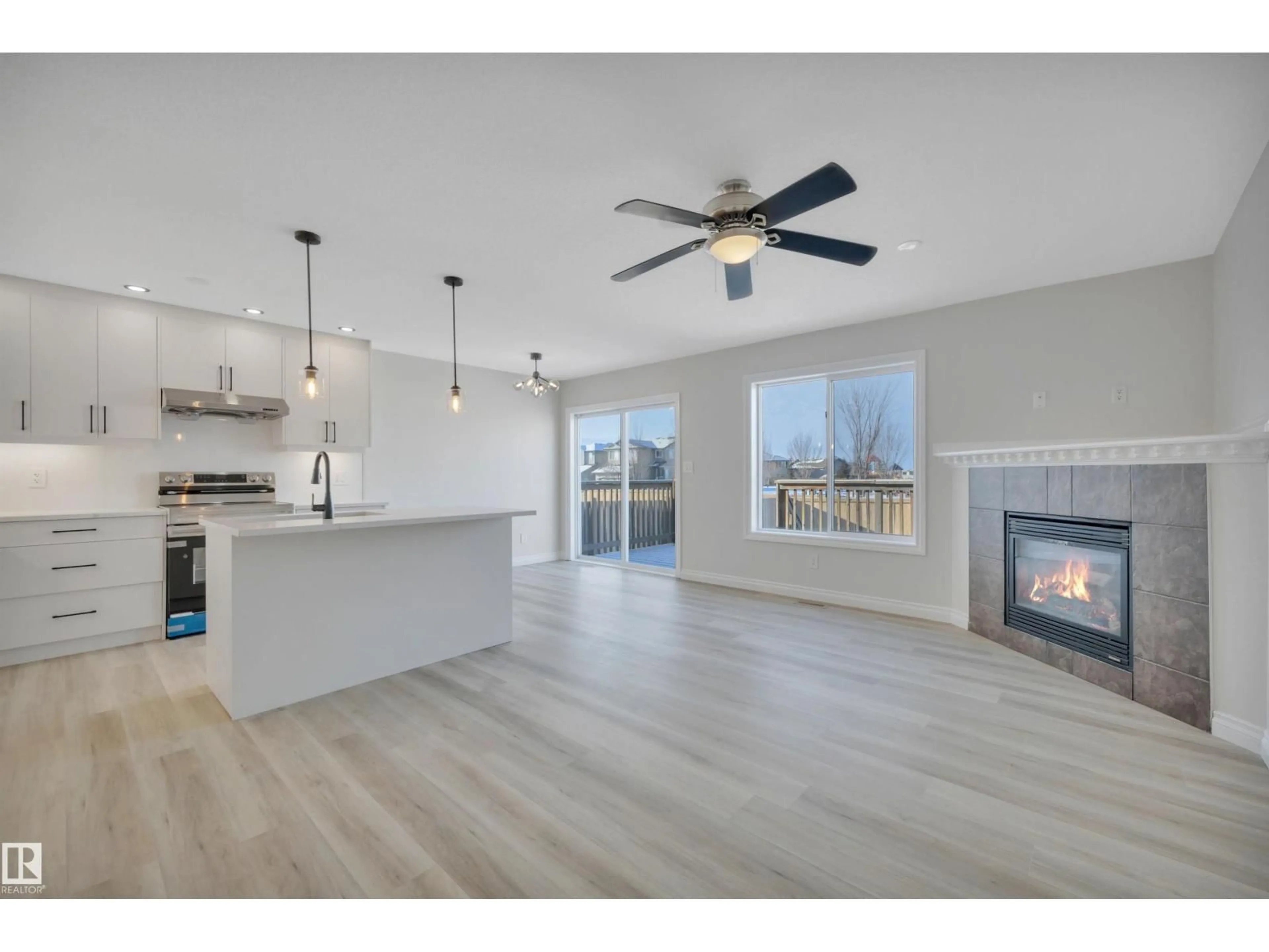 Open concept kitchen, wood/laminate floor for 457 ASTER CL, Leduc Alberta T9E4N9