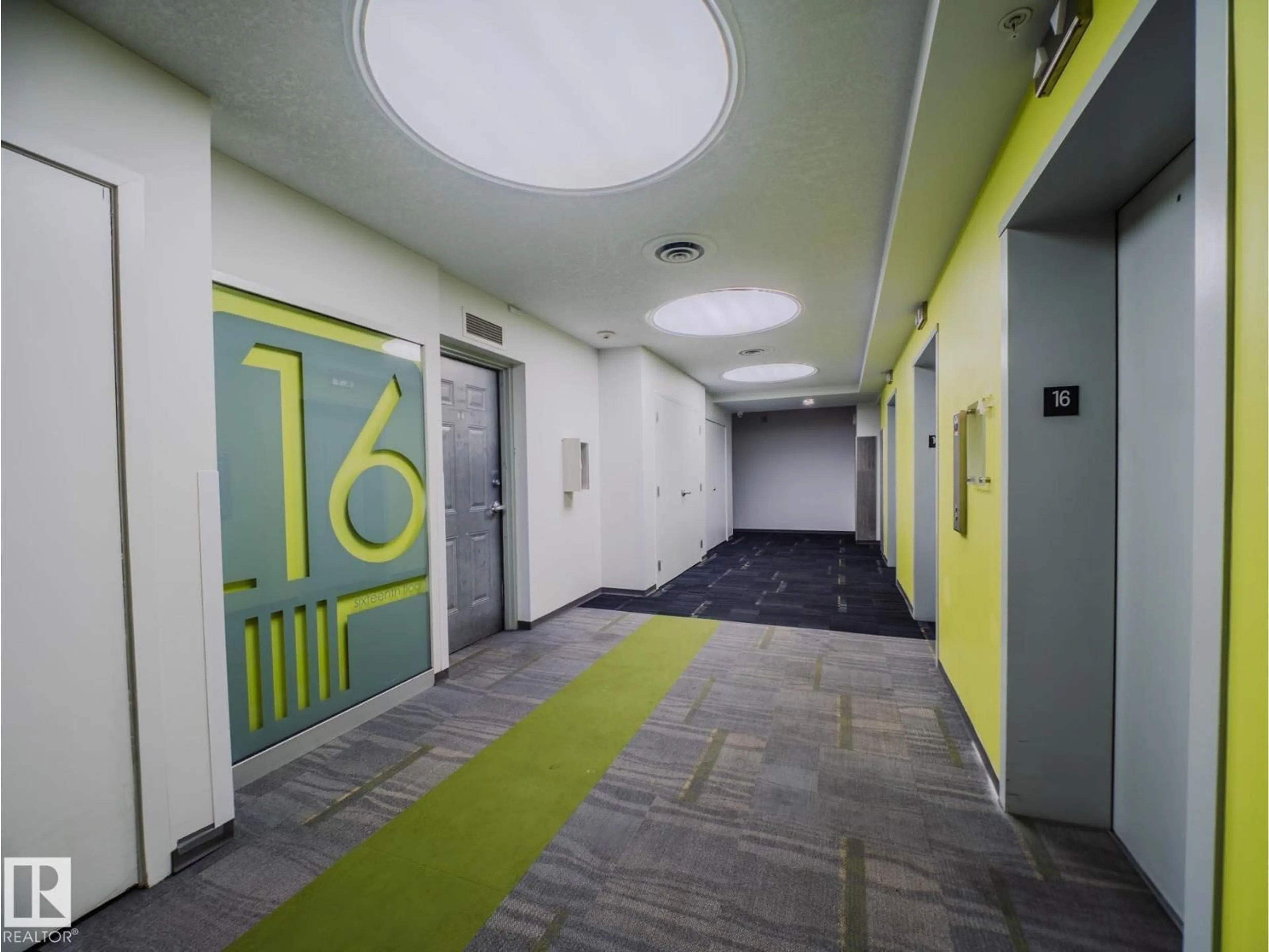 Indoor foyer for 1507 JASPER AV NW, Edmonton Alberta T5J1R9