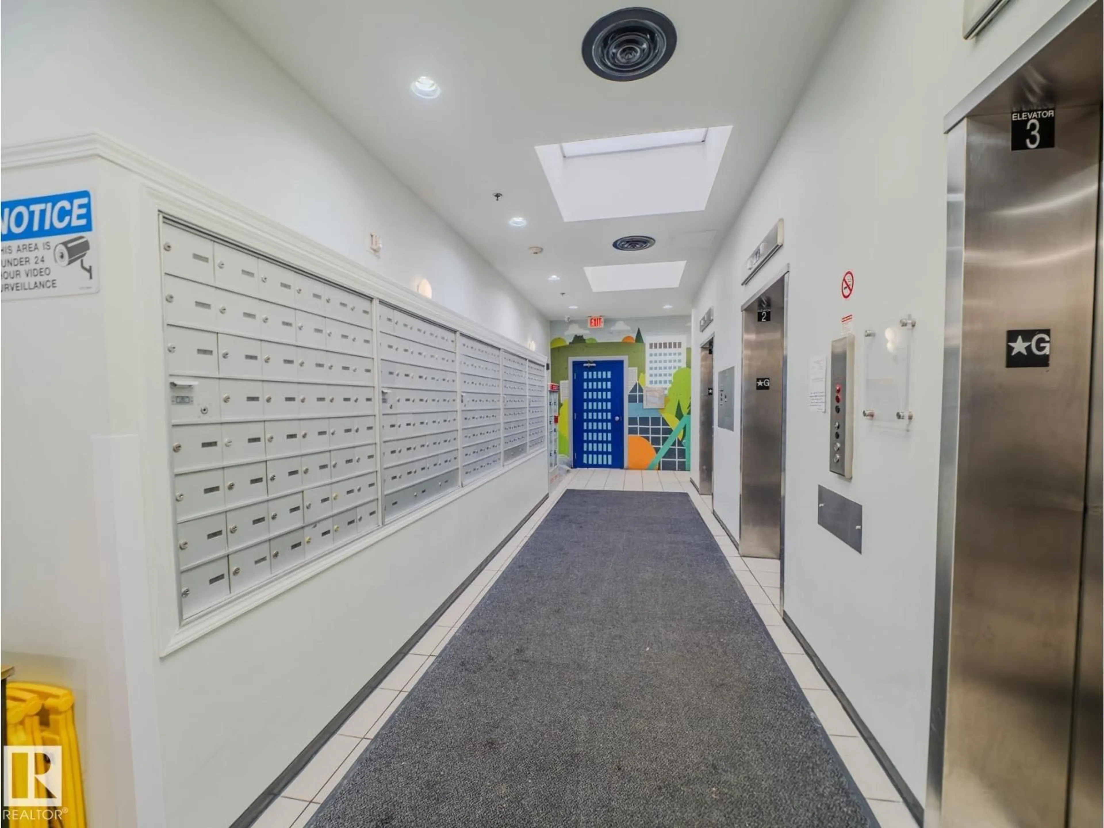 Indoor foyer for 1507 JASPER AV NW, Edmonton Alberta T5J1R9