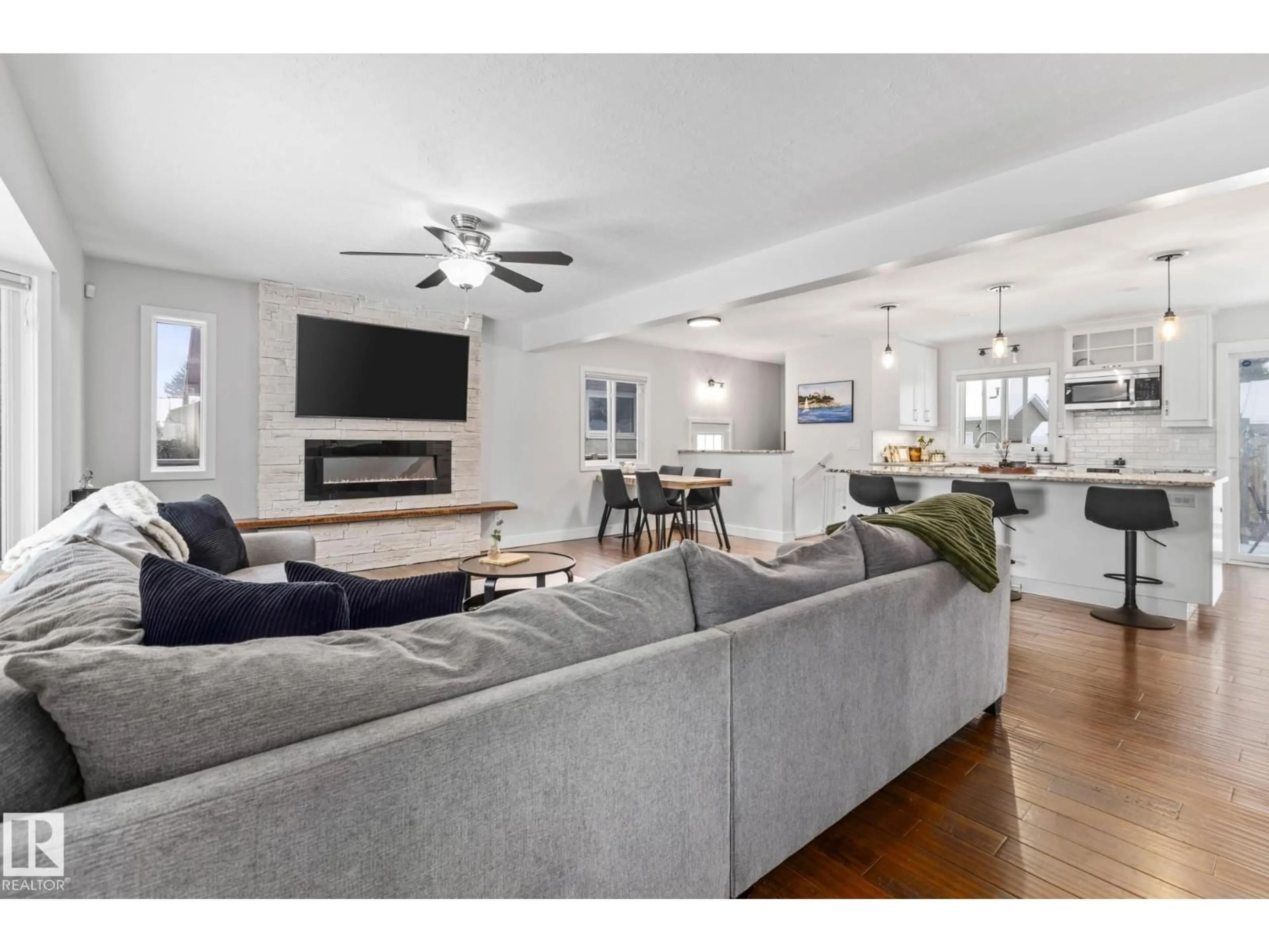 Living room with furniture, unknown for 4303 106 AV, Edmonton Alberta T6A1E1