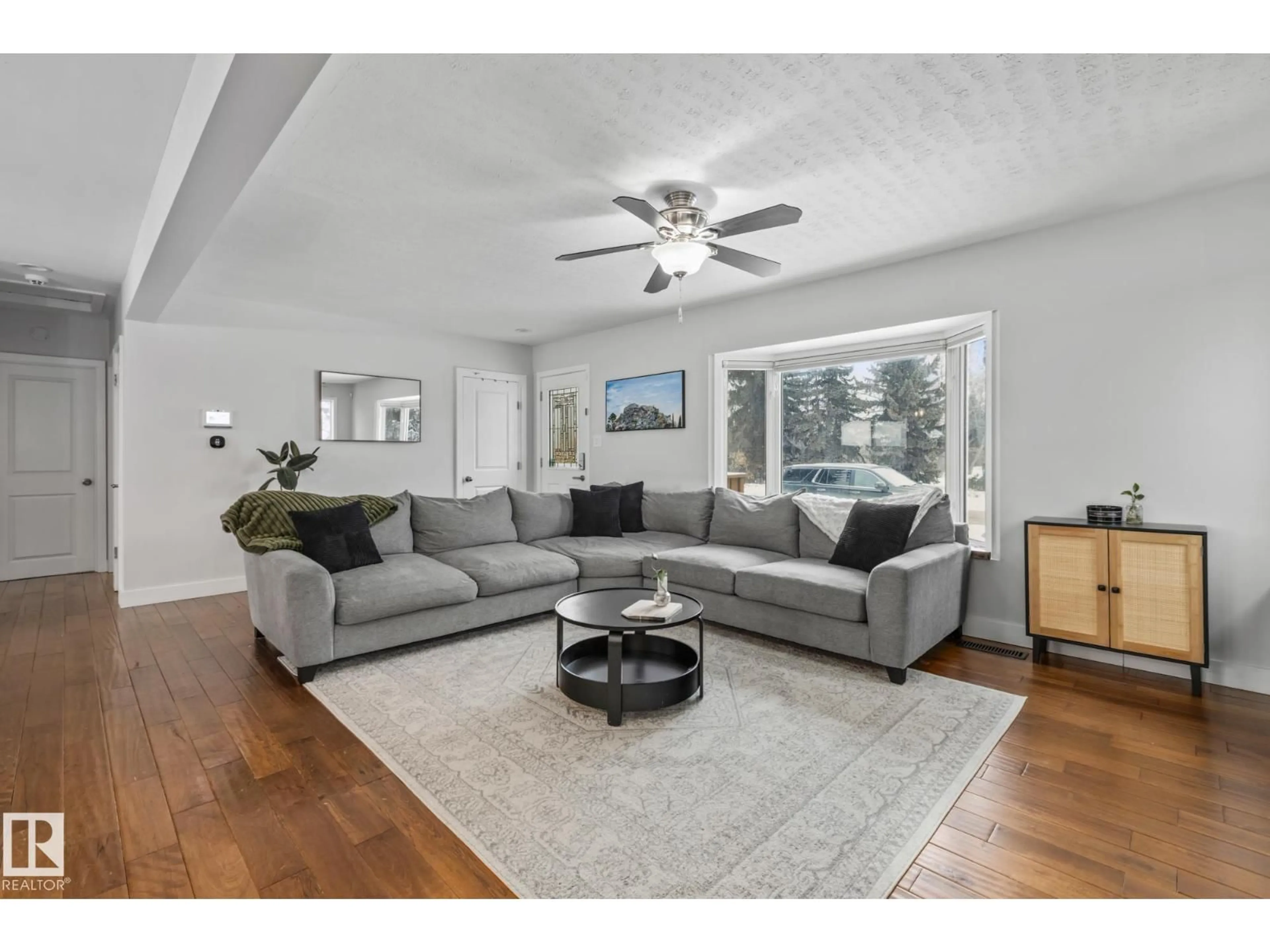 Living room with furniture, unknown for 4303 106 AV, Edmonton Alberta T6A1E1