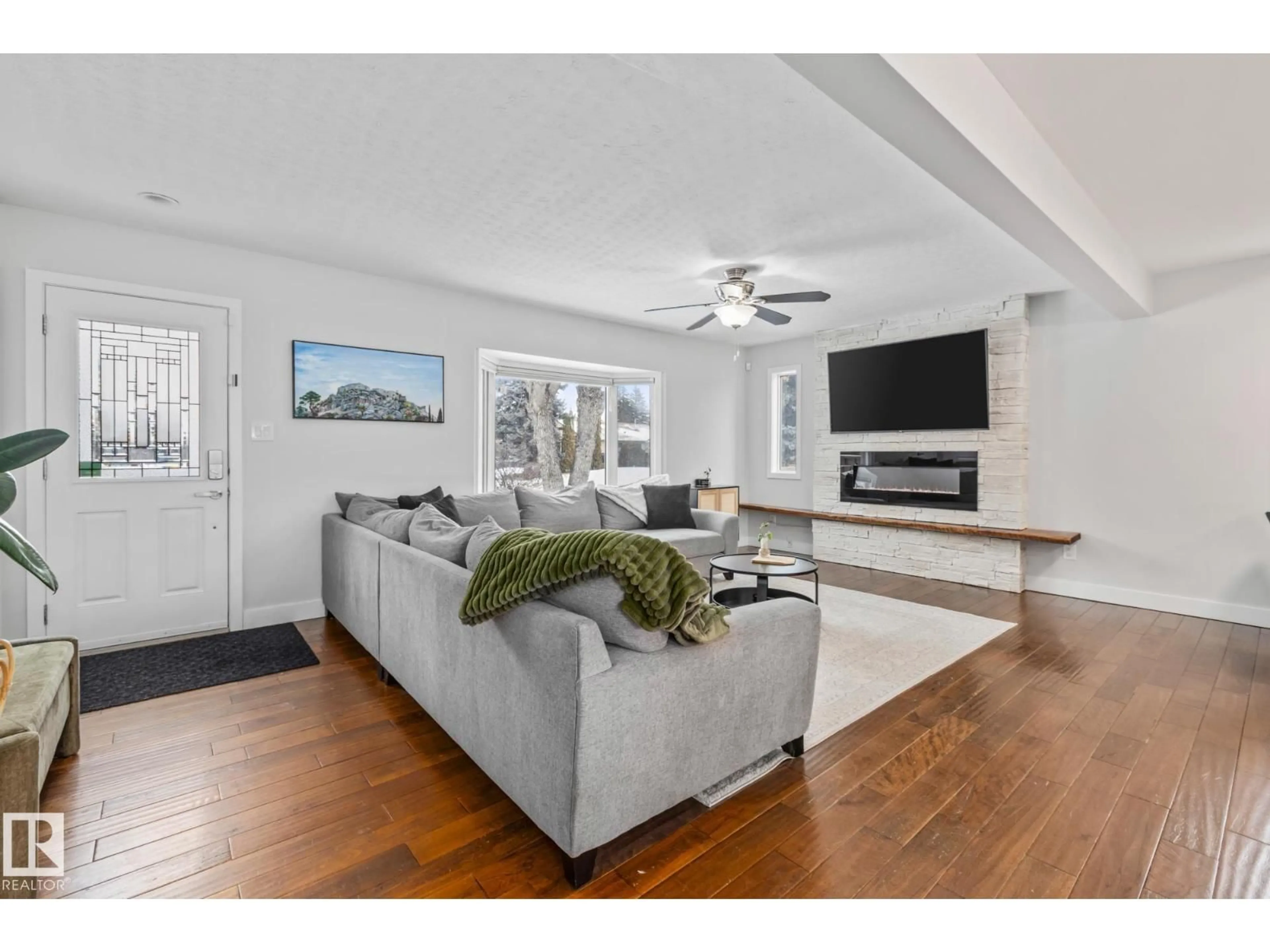 Living room with furniture, unknown for 4303 106 AV, Edmonton Alberta T6A1E1