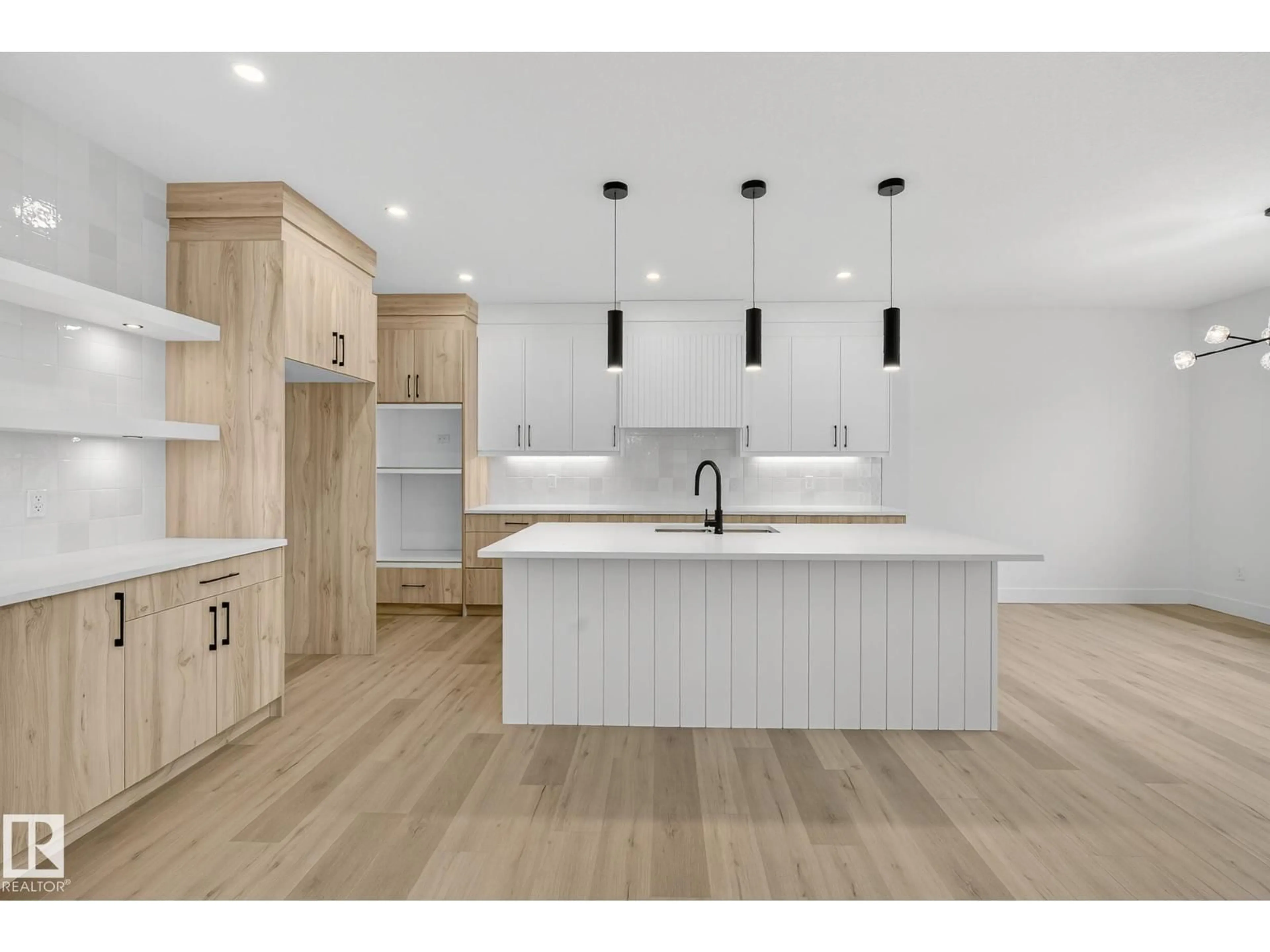 Open concept kitchen, wood/laminate floor for 3306 CHICKADEE DR, Edmonton Alberta T5S0V5