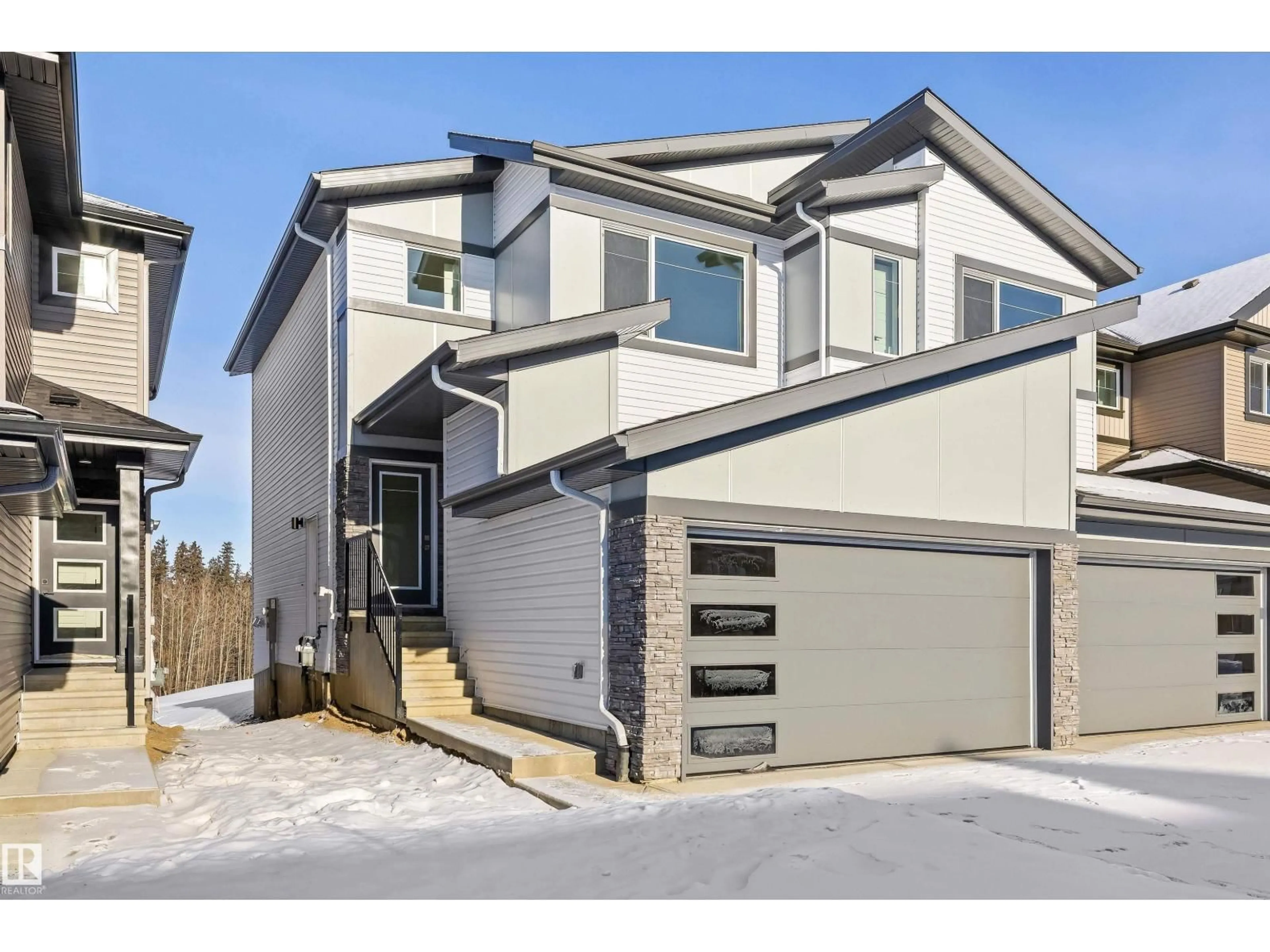 Home with vinyl exterior material, street for 4184 KINGLET DR, Edmonton Alberta T5S0W1