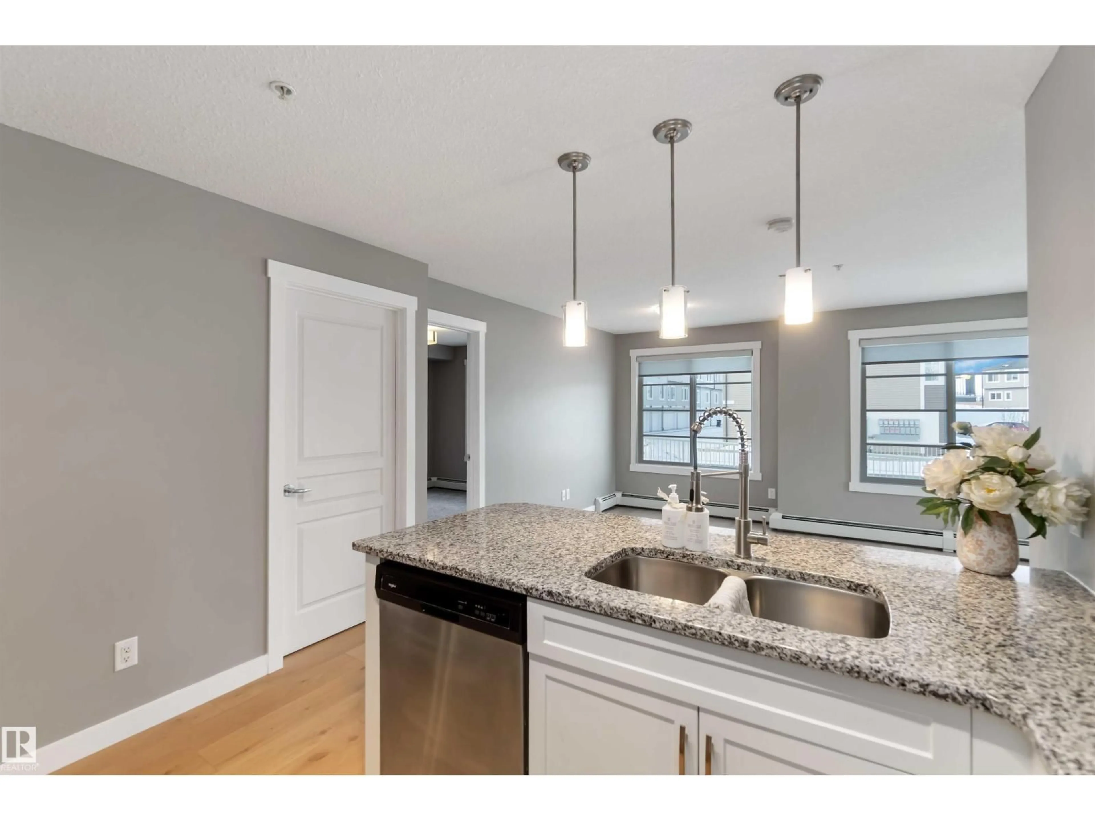 Open concept kitchen, unknown for #101 - 3670 139 AV NW, Edmonton Alberta T5Y3N5