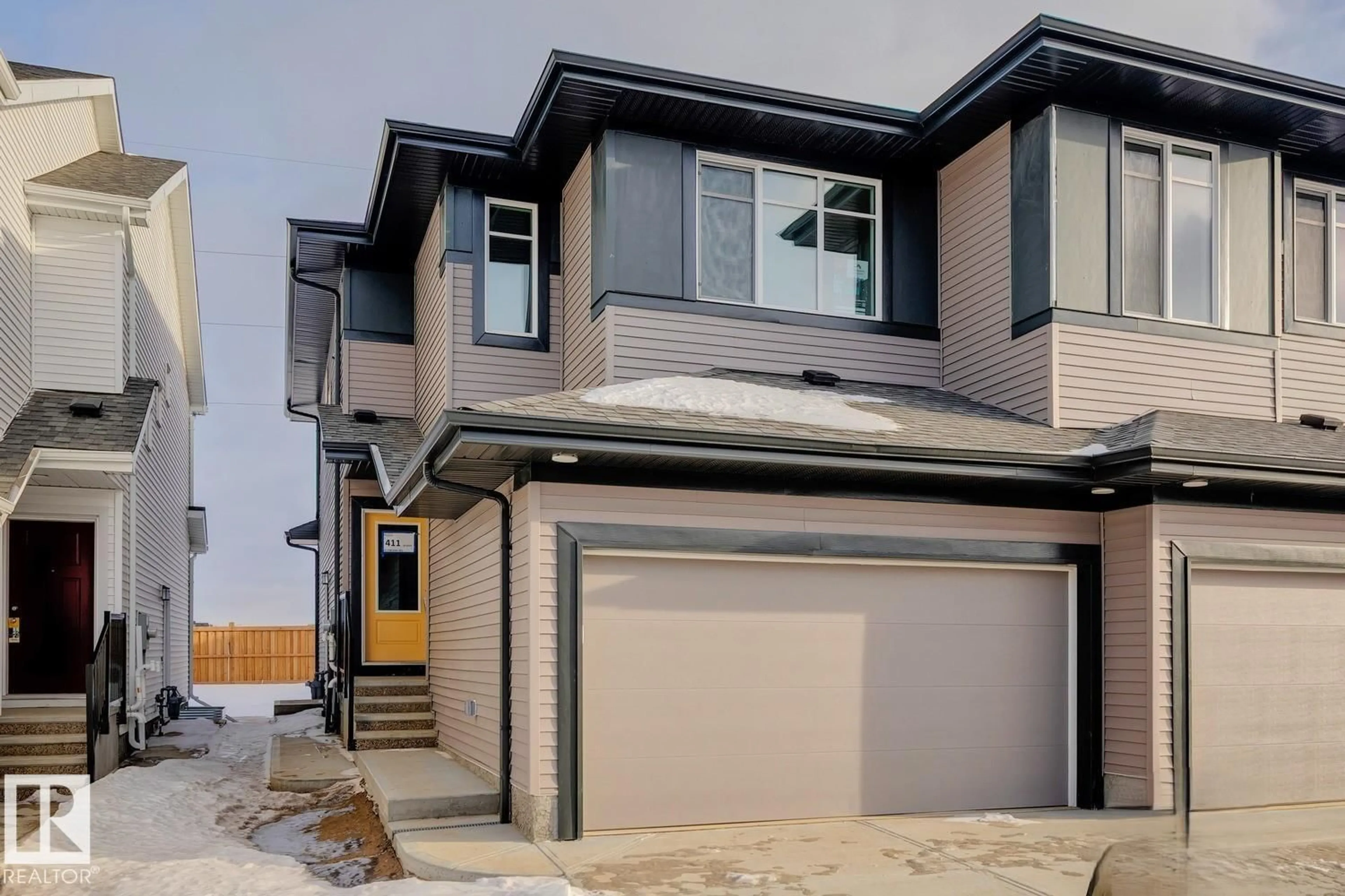 Home with vinyl exterior material, street for SW - 411 26 ST, Edmonton Alberta T6X3J1