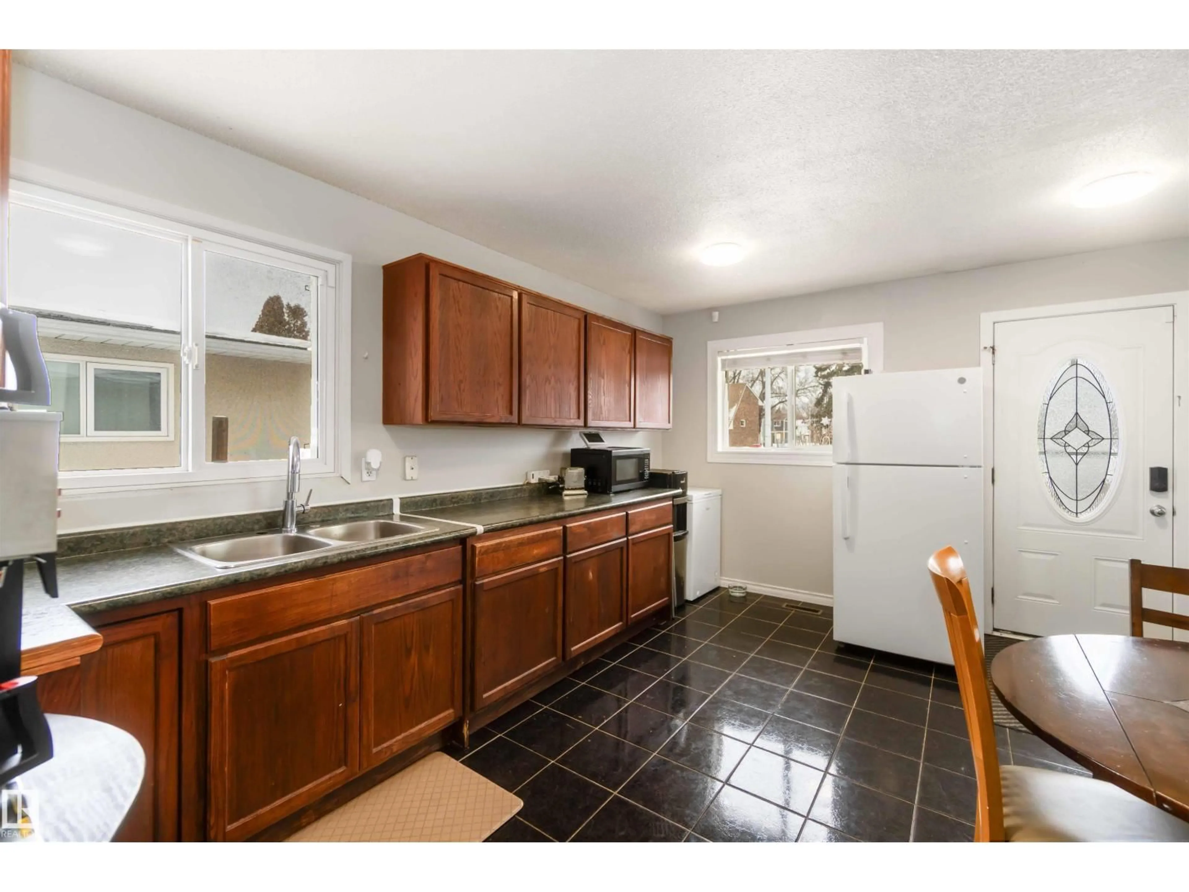 Standard kitchen, ceramic/tile floor for 11306 32 ST, Edmonton Alberta T5W4R9