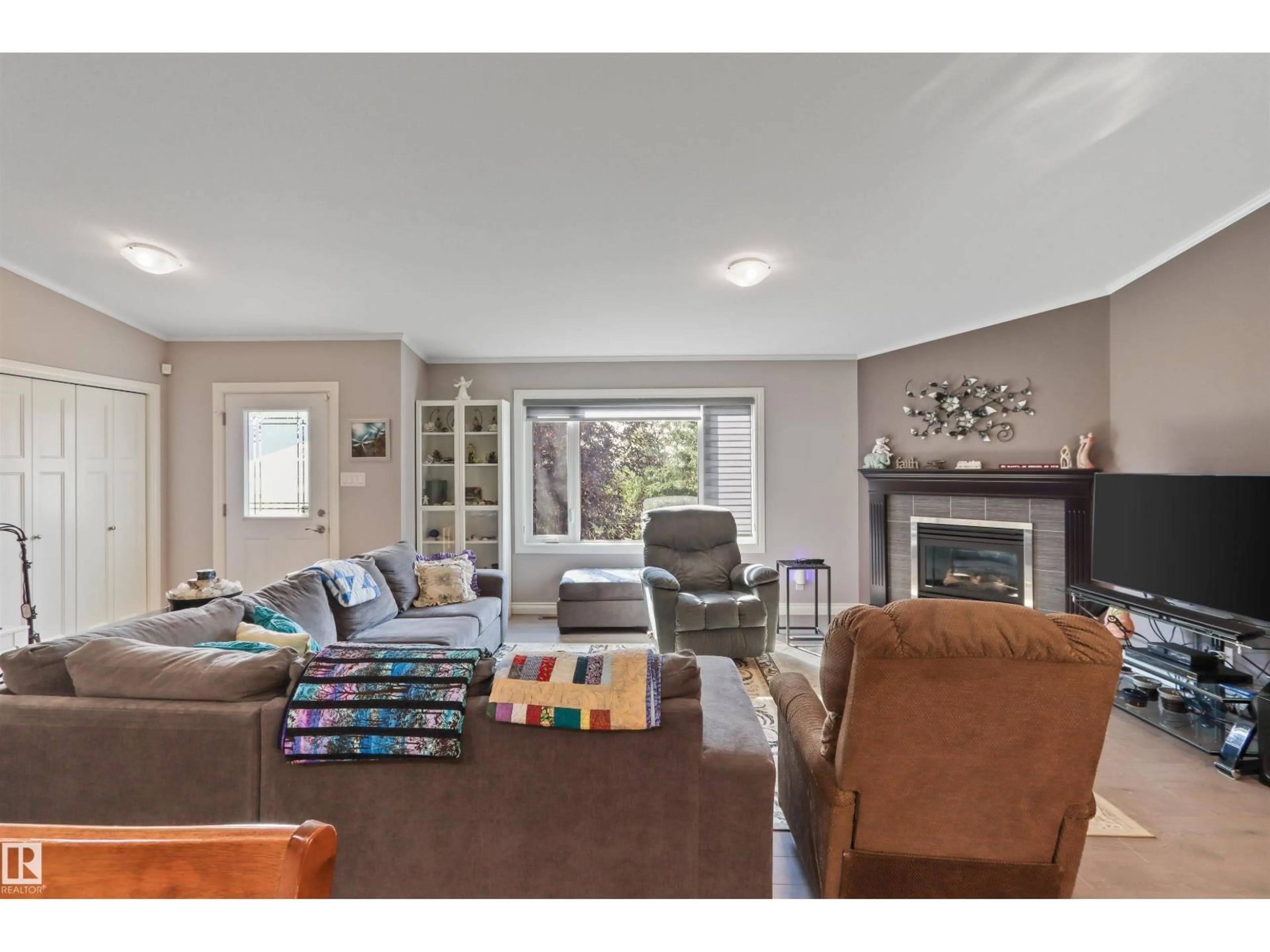 Living room with furniture, wood/laminate floor for 49525 RGE ROAD 85, Rural Brazeau County Alberta T0E1Z0