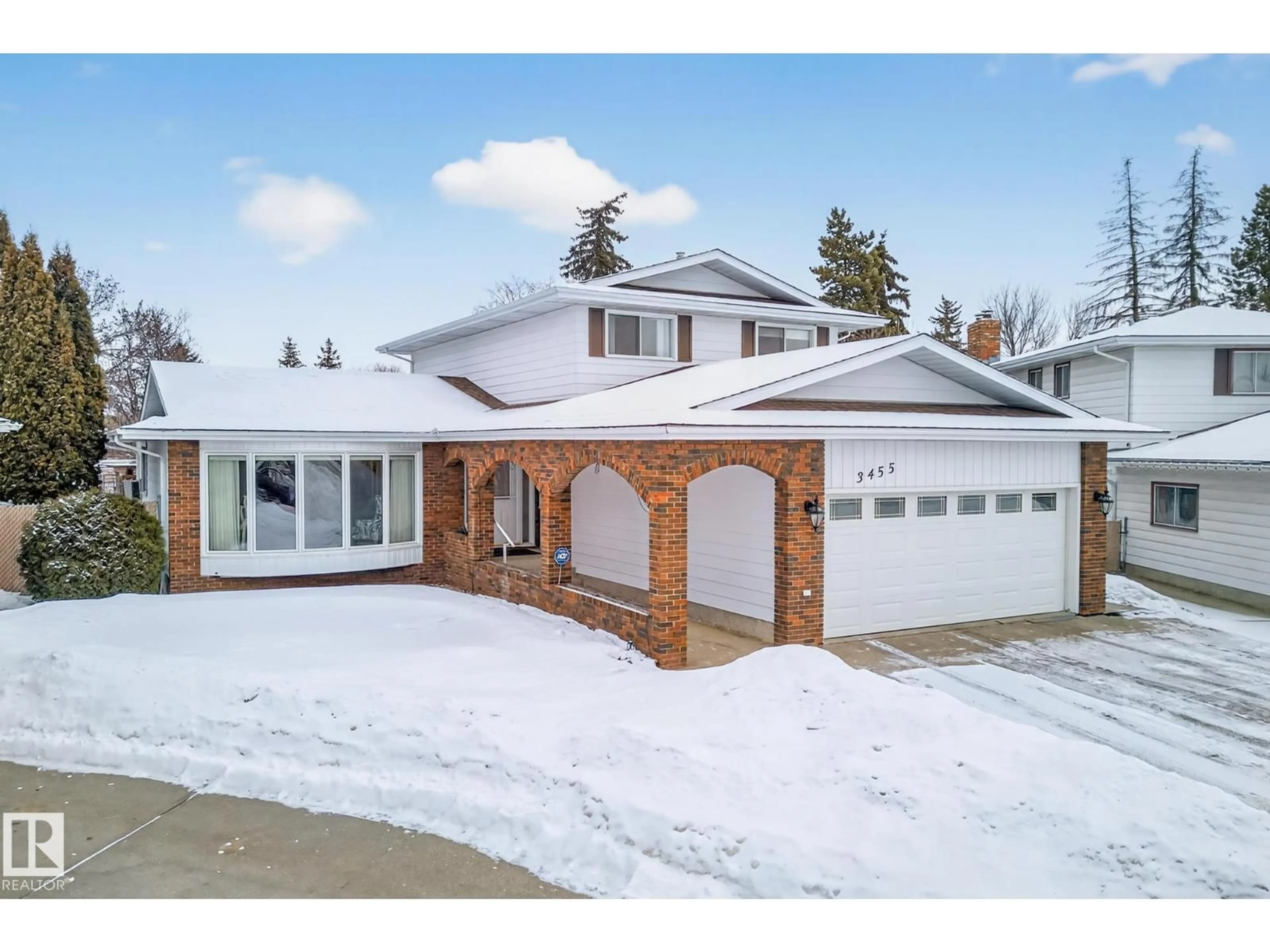 Home with brick exterior material, street for 3455 HILL VIEW CR, Edmonton Alberta T6L2C9