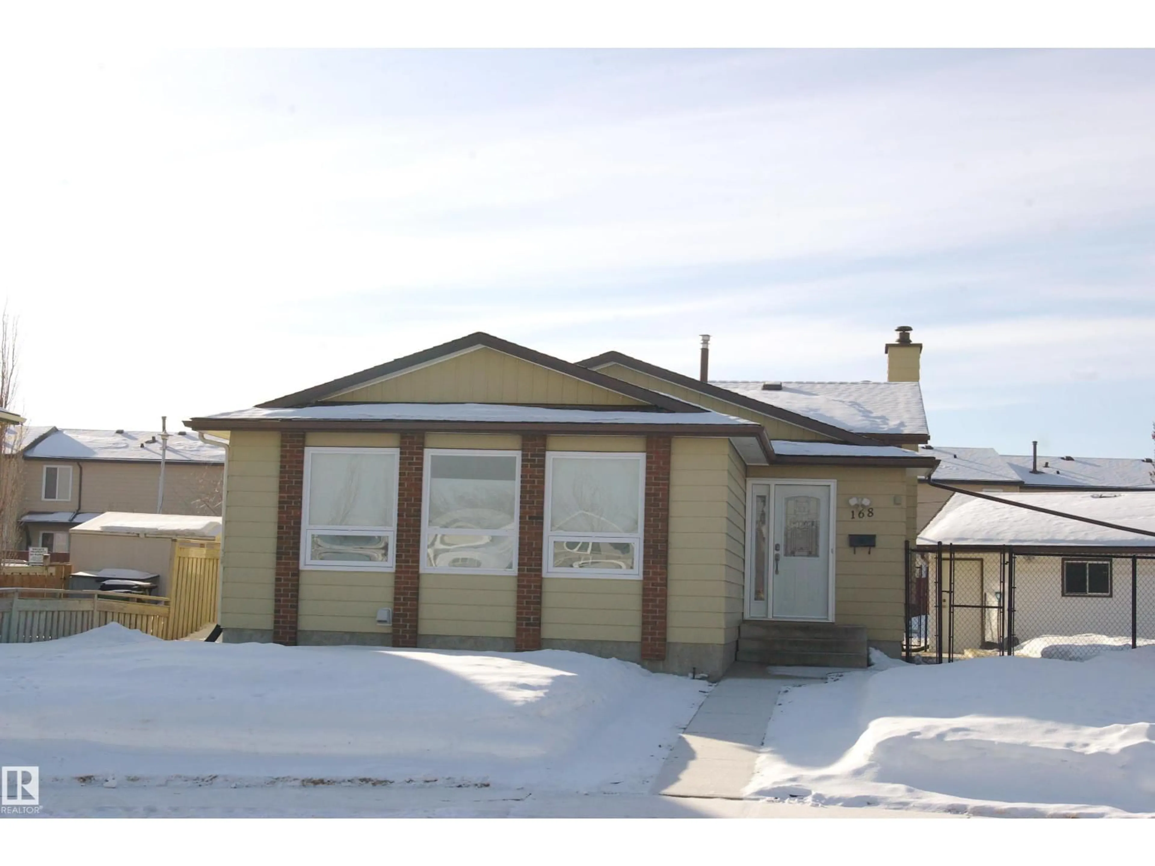 Home with vinyl exterior material, street for 168 WARWICK RD, Edmonton Alberta T5X4P8